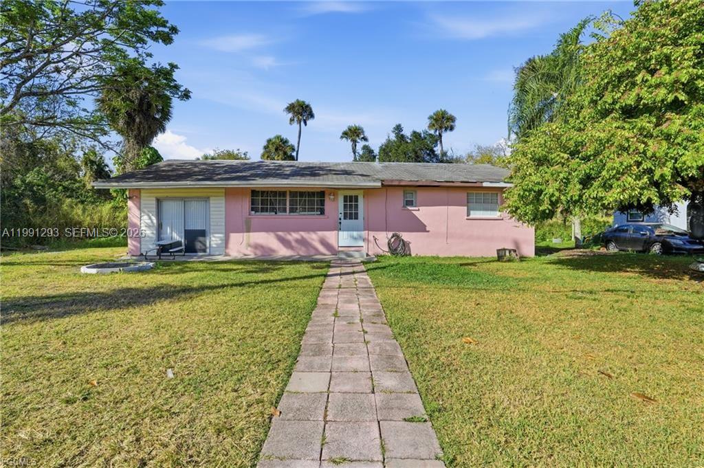 Opportunity awaits your vision. This cozy 3-bedroom, 1-bath home offers approximately 1,000 square feet of living space and is full of potential for the right buyer. Situated in LaBelle, this property presents a great opportunity for a fixer-upper, rental investment, or starter home for those looking to add value through renovations. The home features a functional layout with a comfortable living area, three bedrooms, and a centrally located bathroom. With a little TLC, the interior can be transformed into a warm and inviting space tailored to your personal style or rental needs. Outside, the property offers room to create a welcoming yard or outdoor entertaining space. Whether you envision a cozy front porch, garden area, or low-maintenance landscaping, the lot provides flexibility for improvement. This home is ideal for investors, DIY enthusiasts, or buyers seeking an affordable entry into homeownership. With solid potential and a desirable LaBelle location, this property serves as a strong foundation for future upgrades and long-term value. Bring your ideas and imagination — this is your chance to turn a house into a home.