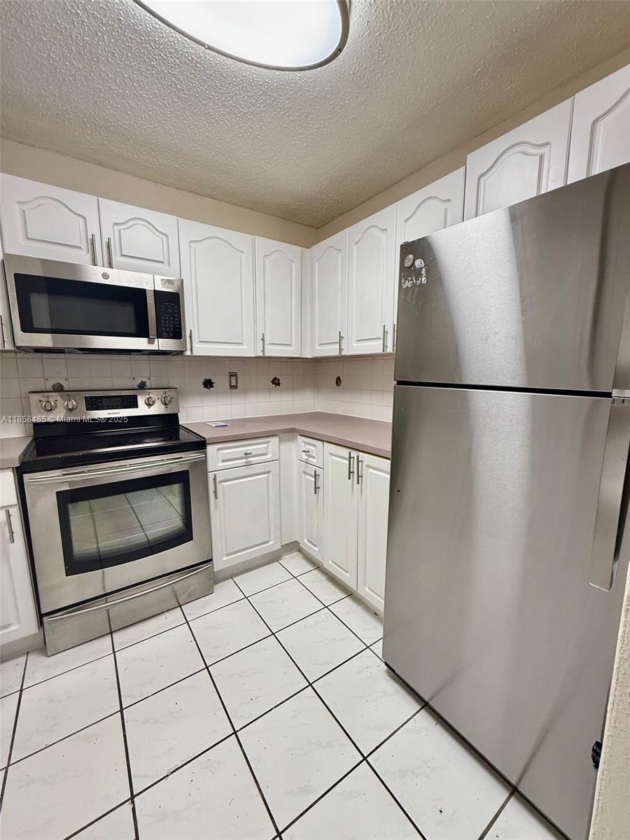 WESTLAND GARDENS CONDO - Residential Lease