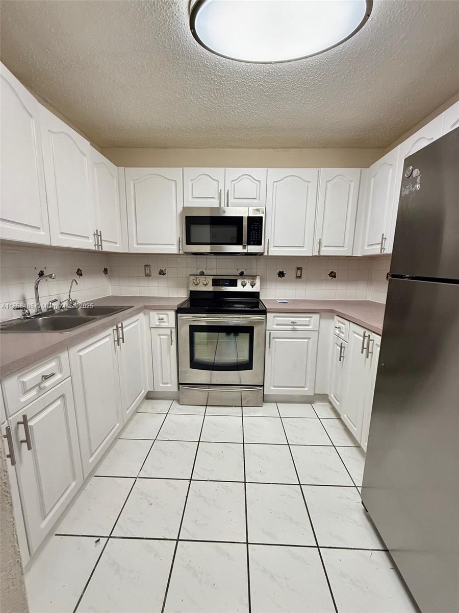 WESTLAND GARDENS CONDO - Residential Lease