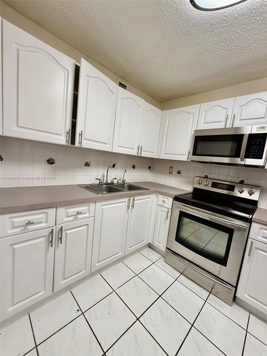 WESTLAND GARDENS CONDO - Residential Lease