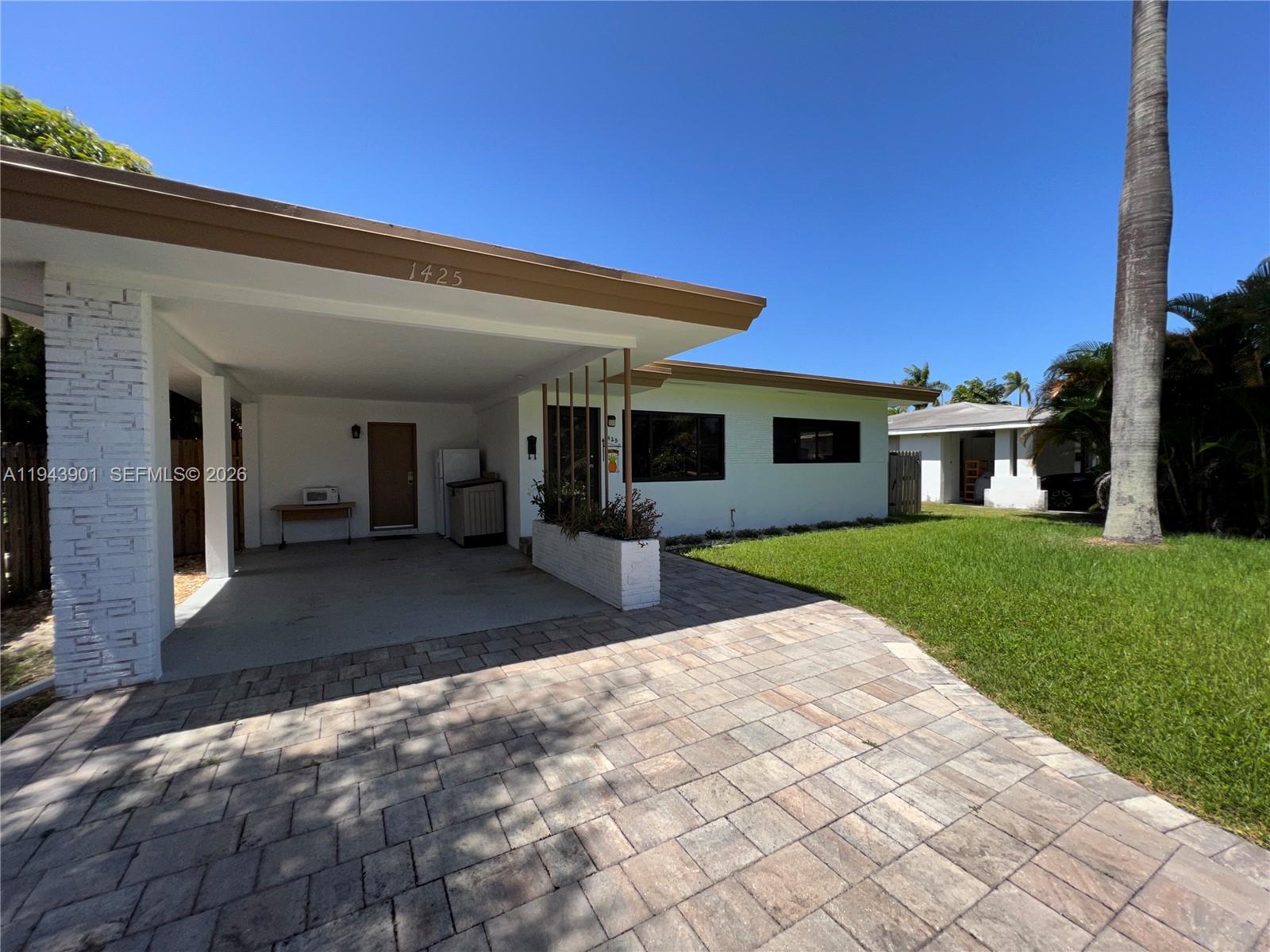 Beautiful home at a great location close to Hollywood Beach, Margarita Ville, Marina boat ramps, Hollywood Beach Golf Club is a few blocks away and within walking and biking a distance to the Hollywood Boardwalk and Downtown, shopping, restaurants and nightlife. This home is ready to move in, has been well maintained inside and out, offers impact windows, Quartzite countertops and a roof age 2023. There is an Alley at the rear of the property for you with easy access to your backyard and with plenty of room for a pool and a large boat in a peaceful setting. Located in the Hollywood Country Club Subdivision east of Federal Highway (US1).