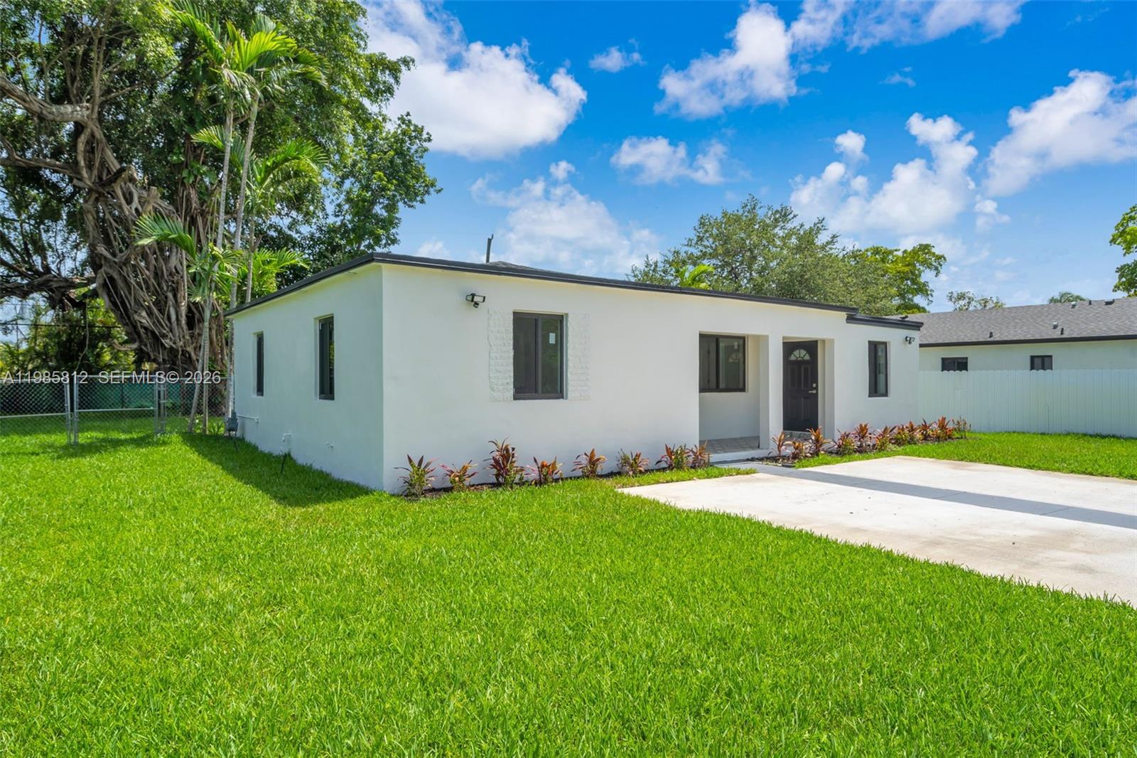 Completely renovated 4-bedroom, 3-bath home with a spacious layout and modern upgrades. Step into the bright living room and open kitchen featuring a gas stove. Home includes a new roof, impact windows, gas tankless water heater, and two master bedrooms—one with a private entrance. Split-bedroom plan offers privacy, with two additional bedrooms on the opposite side. Enjoy a large yard, covered porch, and a huge driveway. Conveniently located near Biscayne Blvd, shopping, restaurants, schools, beaches, and major highways.