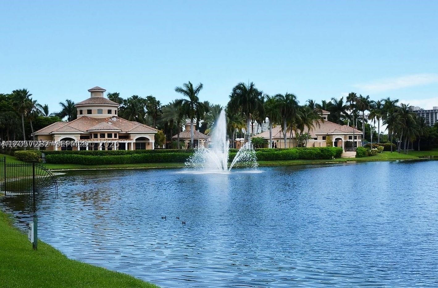 Spectacular Waterfront 2 story townhouse located in Prestigious guard gated community of Harbor Islands. 2 car garage, 3 bd plus den/2.5 baths of pure luxury. Very rare opportunity to own a spacious townhouse with a Deeded boat dock.No fixed bridges to ocean. Can accommodate approximately 40 ft. boat.  Community offers gorgeous clubhouse with multiple pools, tennis courts, state of the art fitness center, 24h gated security, marina, scenic walking and jogging paths, playgrounds. Exceptional price!