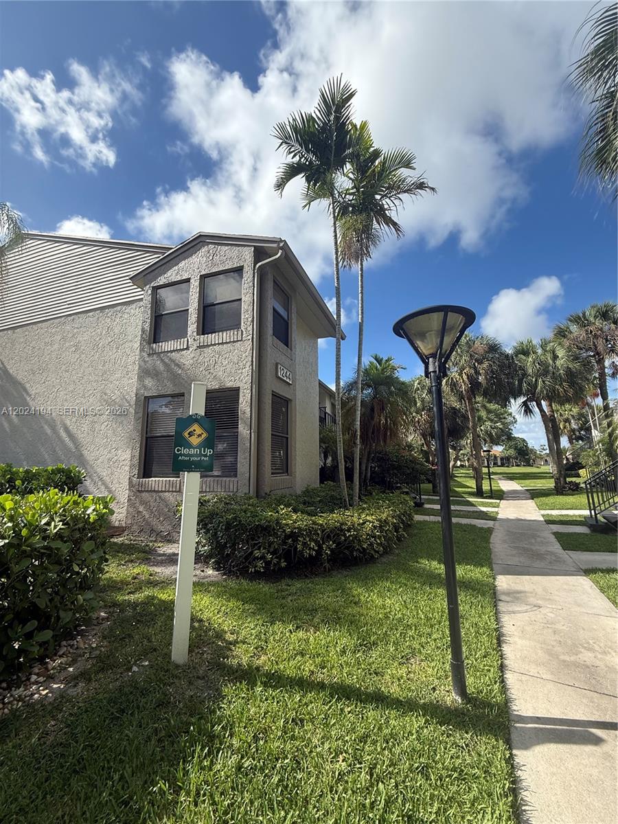 Welcome to this beautifully maintained 2-bedroom, 2-bathroom corner-unit condo located on the 1st floor in a family-oriented community. This bright and spacious home features a beautifully renovated kitchen with ample space for cooking and entertaining, a tastefully renovated master bathroom, and elegant tile flooring throughout. Natural light fills the unit, creating a warm and inviting atmosphere that truly feels like home.

The community offers excellent amenities including a sparkling pool, fully equipped gym, and a large clubhouse for residents to enjoy. Conveniently located near the Sawgrass Expressway and Interstate 95, this condo provides easy access to shopping, dining, and major commuting routes. You’ll also appreciate being within walking distance to Publix and only a short 10-minute drive from the beach. 

Pet friendly. Commercial vehicles allowed.

This home has been lovingly cared for and holds great sentimental value, making it a truly special place for its next owners to enjoy.

Brand new Roof being installed. Assessment will be paid by Seller at closing.

Call listing agent today to schedule your private appointment.