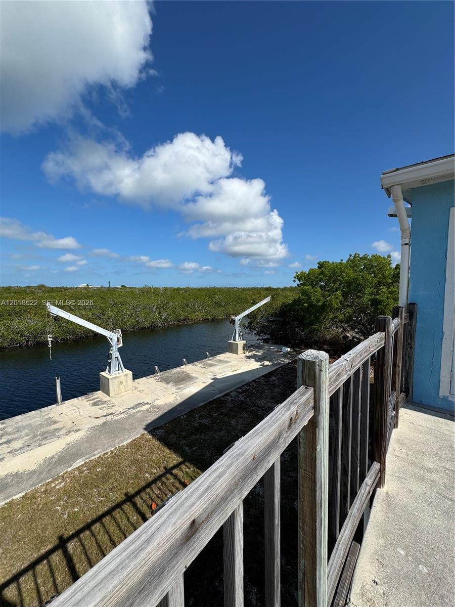 Welcome to your slice of paradise! Down in Big Torch Key, you'll feel a sense of solitude, satisfaction and serenity. Minimal, if any, noise or light pollution on this Key; look up at night and you will see stars you've never seen before! Quick and easy access to the Atlantic and Gulf of America, plenty of fishing spots and places to relax on the water without those big upper Key crowds. The adjacent vacant lot for sale is owned by the same person - a perfect opportunity to purchase two lots and transform into one! With this dock size already at 65', imagine how many more boats you could dock with both lots!

Vacant land MLS#A12018646

**Water photos at the end are for reference to show what the water looks like at the end of the canal. This home does not directly have this view**