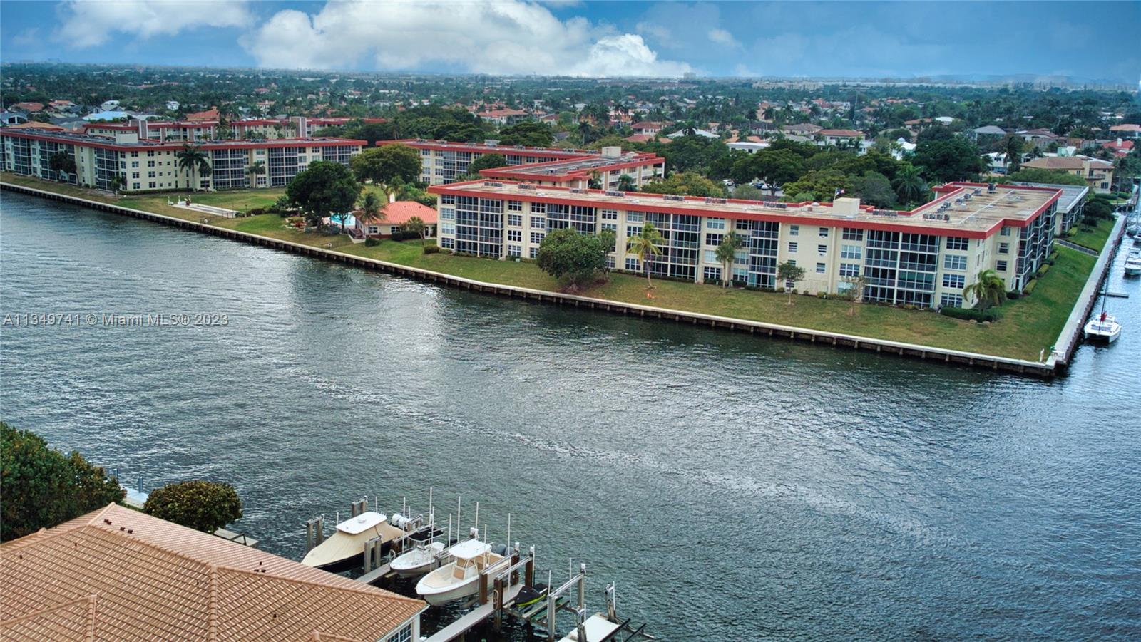 This your opportunity to own a Oceanfront condo in the hidden gem of Palm Aire at Coral Key in Lighthouse Point! Condo features  2 Beds/2 Full Baths. Both bedrooms are en-suite,  Unit is Facing the Intracoastal on the Penthouse Level,  tile floors, spacious layout, Stainless Steele appliances, Impact Windows and Amazing views.  Laundry facilities on the same floor. Palm Aire at Coral Keys is highly sought after serene complex with limited available units for sale. Community features a clubhouse which has many planned activities and also offers the ability to rent for private functions.  Your boat (up to 45 ft) is welcome, as dockage is available for owners through the association. Now, is the time to take action and own a condo with a view.