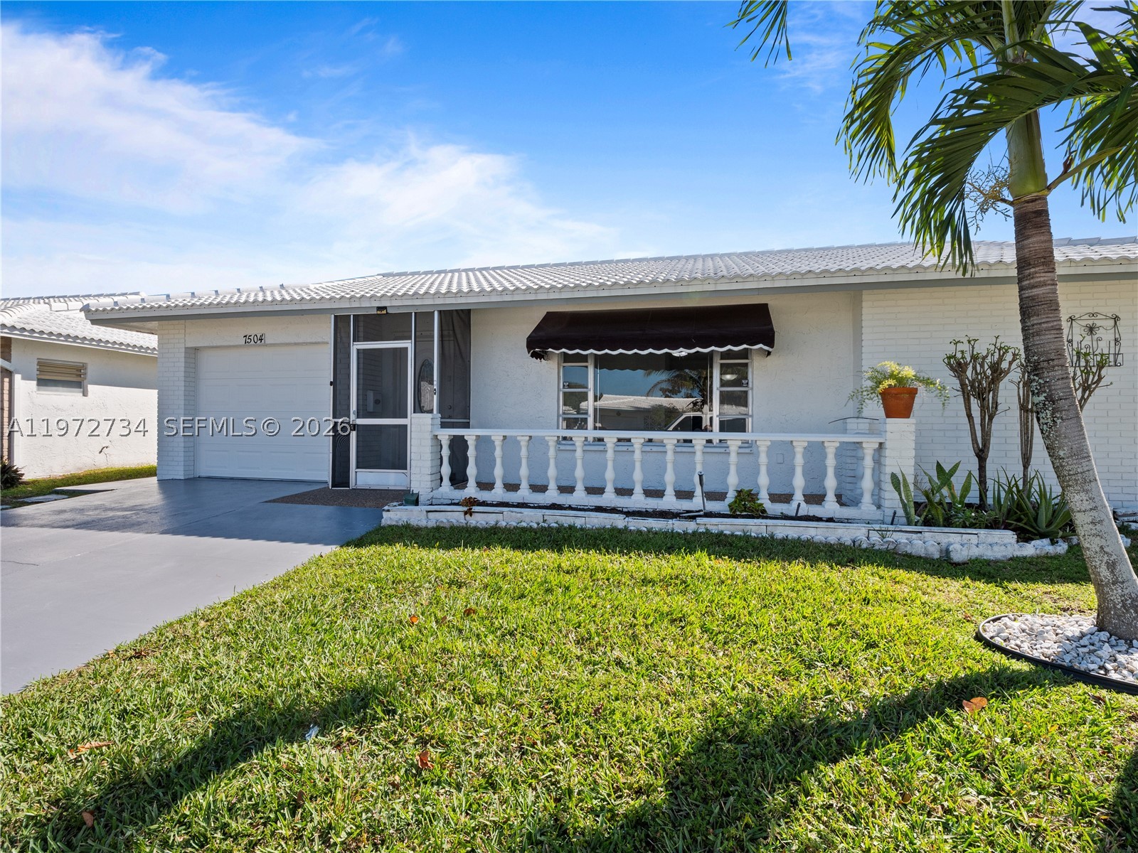 just Reduced ...... Don't miss this amazing opportunity! Beautiful 3-bedromm, 2-bathroom home. Remodeled bathrooms and kitchen. Impact-resistant garage door. New automatic garage door opener. The Florida room has been converted into an additional room with AC and closet. Living and dining room, plus an additional room for TV or Study. Spacious backyard with well-maintained soursop, mango, and avocado trees, overlooking the clubhouse and pool. The HOA covers lawn maintenance, exterior painting, and roof cleaning. No residents under 18 is allowed, and one resident must be over 55. Rentals are permitted starting in the second year. Conveniently located near shopping, restaurants, and major highways. Move-in ready!.
