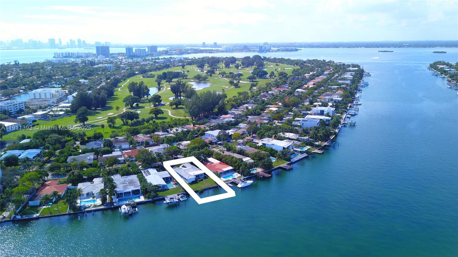 Shovel-Ready Waterfront Investment 72’ on the Bay! Oversized 11,237 sq ft lot with 6,100 sq ft open-bay footprint. Permits submitted over a year ago, approval expected any day. Build for profit or create a custom dream home with panoramic water views—rare near-ready waterfront opportunity! Direct Ocean Access No-Fixed Bridges. Golf-cart lifestyle, 24-hour security picture perfect family safe-zone. A Rare Gated Golf Course Community with Country Club Offering: Food & Beverage Program, 4 Tennis Courts, Kids Playground. Walking distance to the ocean, mins to Downtown, Airport, Design District, Bal Harbor Shops, South Beach. $2 billion Masterplan Redevelopment projected to enhance property values, upgrade amenities; a true investment opportunity in the making! Available now, but not for long