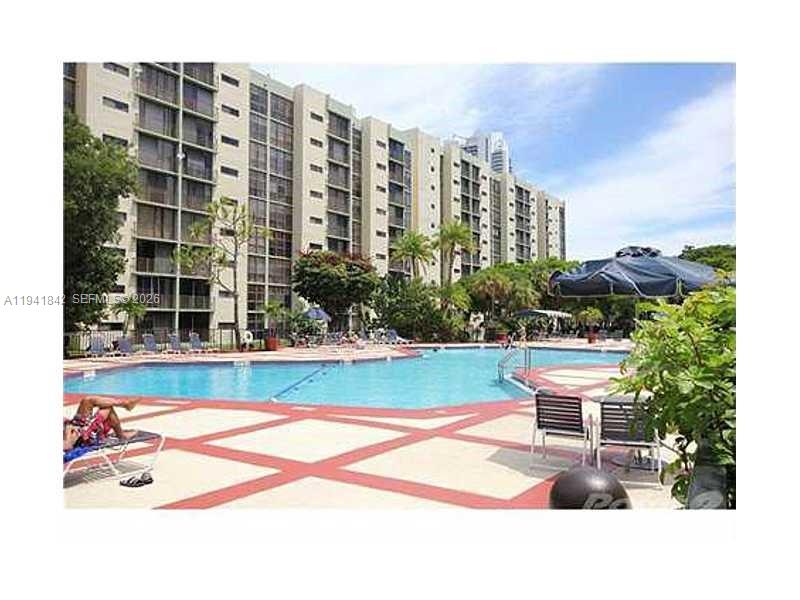 Lowest price 1 Bd unit in Sunny Isles!! Drastically reduced! Great location, just steps from the sandy beach, shopping and transportation!  This 1 bd, 1.5 baths condo boasts an open-concept layout with an upgraded kitchen, complete with a movable island, seamlessly flowing into the living and dining areas.  Master suite features a master bath with bathtub/shower combination and spacious walk-in closet.  Newer AC unit and hot water heater. One assigned parking space plus one additional covered parking.  Cable/internet included in maintenace. Plaza of Americas is a gated complex sith many amenities like security guard at gate entrance, community pool and jacuzzi, newly renovated gym and sauna, basketball and tennis courts, barbecue area and management on site.