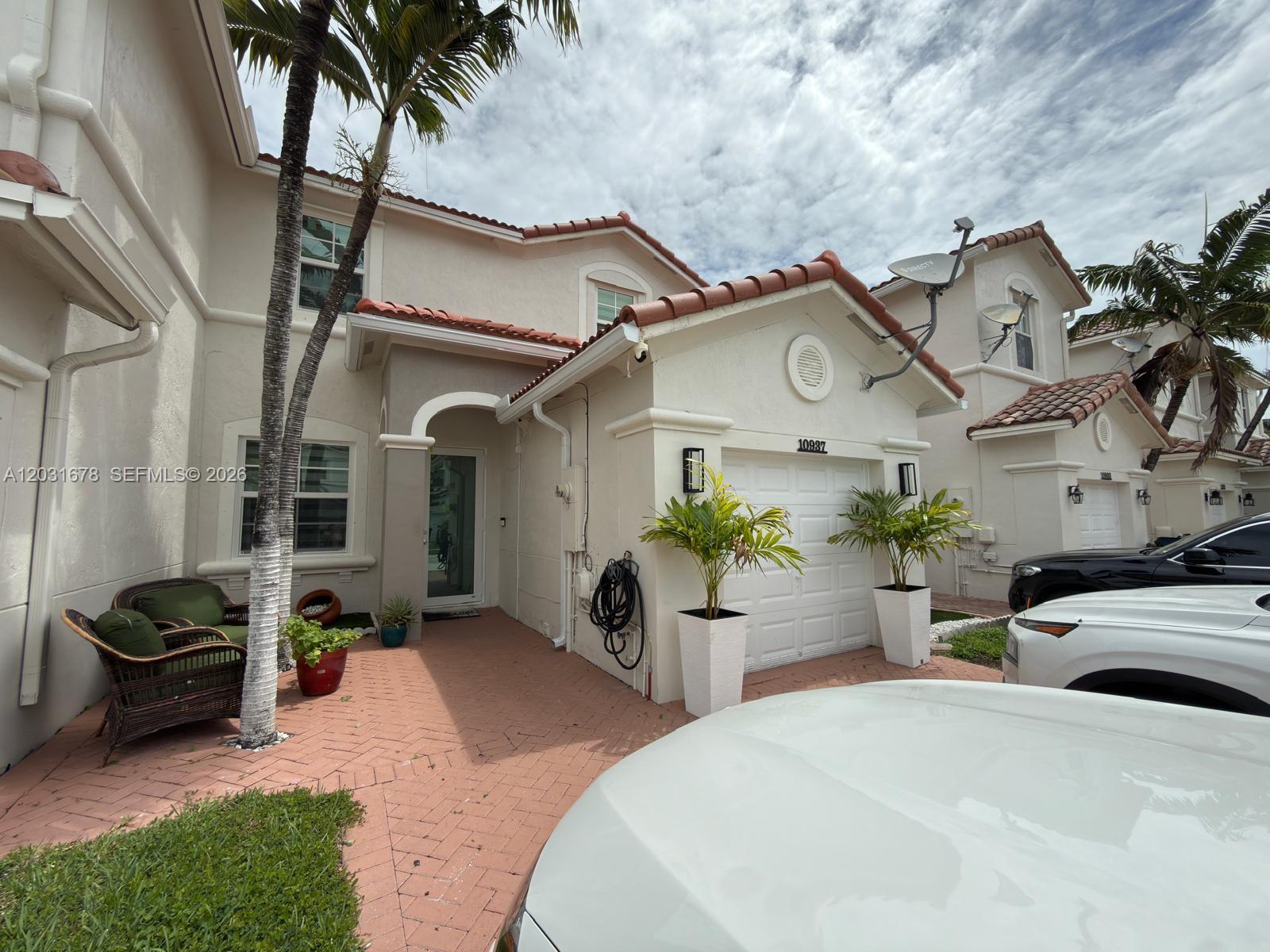 Come and see this beautifully updated townhome featuring 4 bedrooms and 4 bathrooms according to the owner, along with a versatile den and a private in-law suite, all located in a charming neighborhood.

The home offers tile flooring throughout, a bright and functional kitchen with white cabinetry and stainless-steel appliances, and spacious living areas designed for comfort and everyday living. The private in-law quarters provides additional flexibility and living space, making it ideal for extended family, guests, a home office, or other personal needs.

Step outside to enjoy the covered terrace overlooking a low-maintenance turf backyard complete with a jacuzzi, storage shed, and fully functional kitchen creating the perfect space for relaxation and entertaining.

Additional highlights include a brand-new roof (2026), fully permitted renovations, and impact-resistant windows and doors throughout the property.

All indoor appliances are included in the sale. Outdoor appliances are excluded.