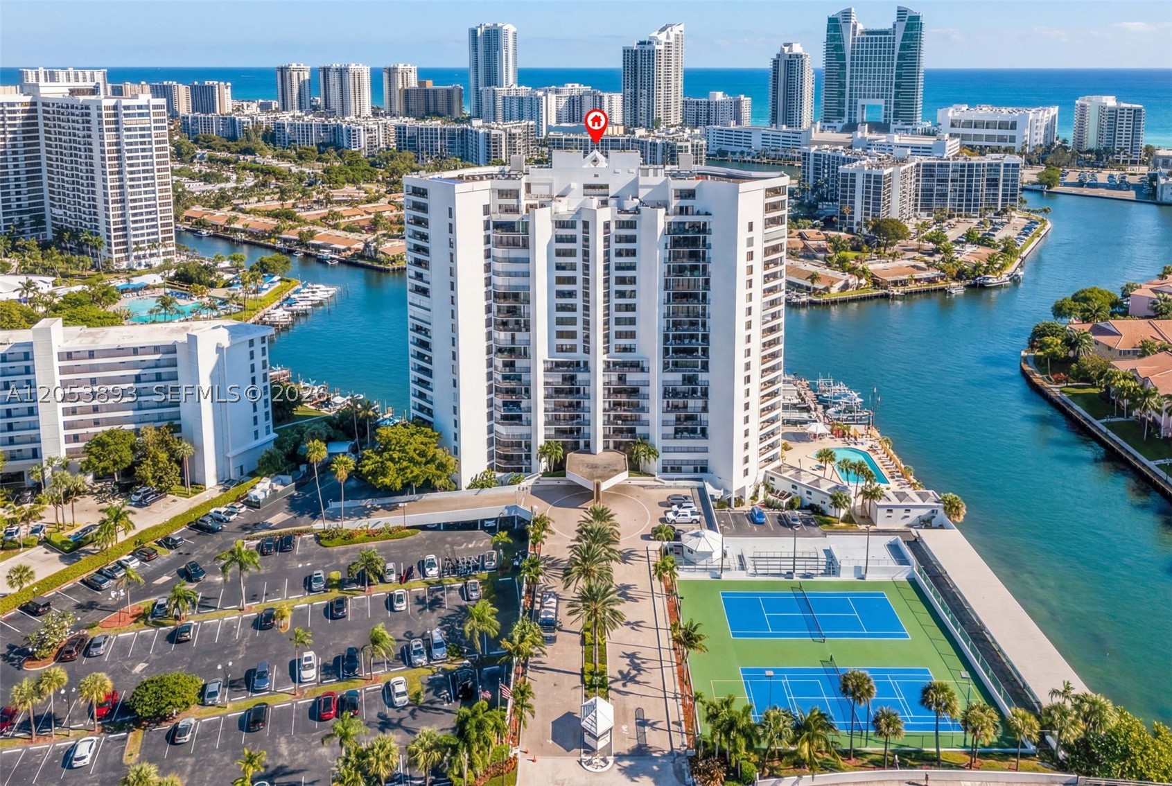 BEST BUY in Anchor Bay Club !! This spacious (1692 sq ft) 7th floor waterfront unit features abundant natural light, generous closet space, WASHER and DRYER IN UNIT, and a TWO private balconies perfect for enjoying the South Florida lifestyle. The split-bedroom floor plan offers privacy for owners and guests alike. Well-maintained ( 40 year nearly complete)  building with resort-style amenities including a heated pool, fitness center, clubhouse, tennis courts, and 24-hour security. Ideally located just minutes from the beach, Gulfstream Park, Aventura Mall, restaurants, shopping, parks, marinas, and major highways. Perfect as a primary residence, seasonal retreat, or investment opportunity. Easy to show. Price includes one covered parking spot and one uncovered, an additional covered spot can be purchased for an additional 35000. Storage unit also available for 35000. Marina slips often available for sale or rent. 40 year assessment has been paid in full.