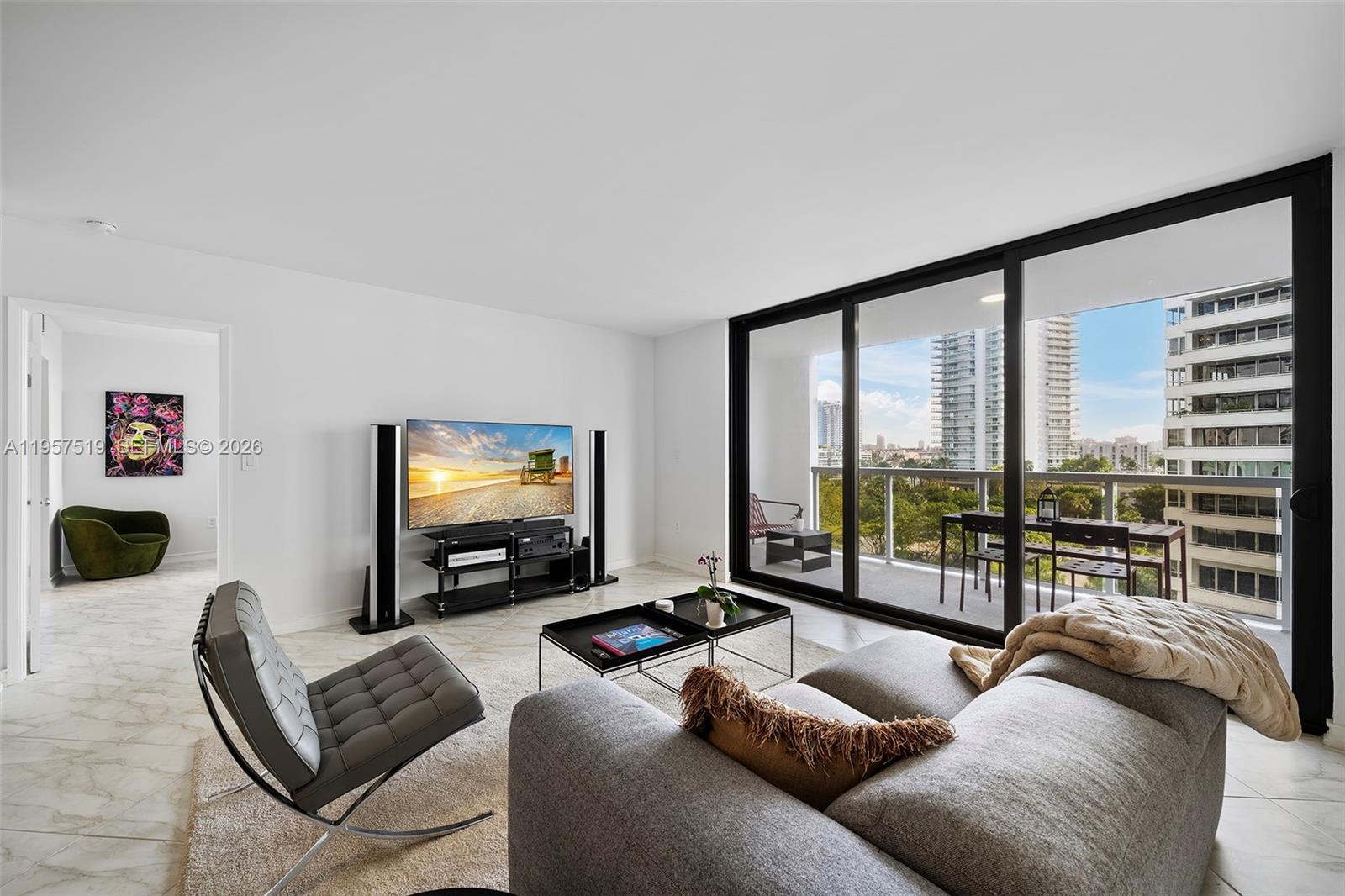 Welcome home to Unit 710 at "9 Island": An elegantly renovated 2-bedroom in one of Miami Beach’s most desirable neighborhoods, Belle Isle. Featuring new impact windows, refinished ceilings, new appliances and more. Enjoy views of Belle Isle Park and partial Bay Views from your balcony, and a comfortable & spacious split floor plan interior. Unit 710 includes covered parking and extra storage space. Nine Island Avenue is a Full Service luxury building with beautifully updated hallways, lobby and mezzanine levels. Amenities include a State of the Art Fitness Center, Children's Play area, Tennis Courts, Boat Slips & Community Room – many of which overlook Biscayne Bay. Centrally located with easy access to Sunset Harbour’s best restaurants and boutiques, Lincoln Road & Downtown Miami.