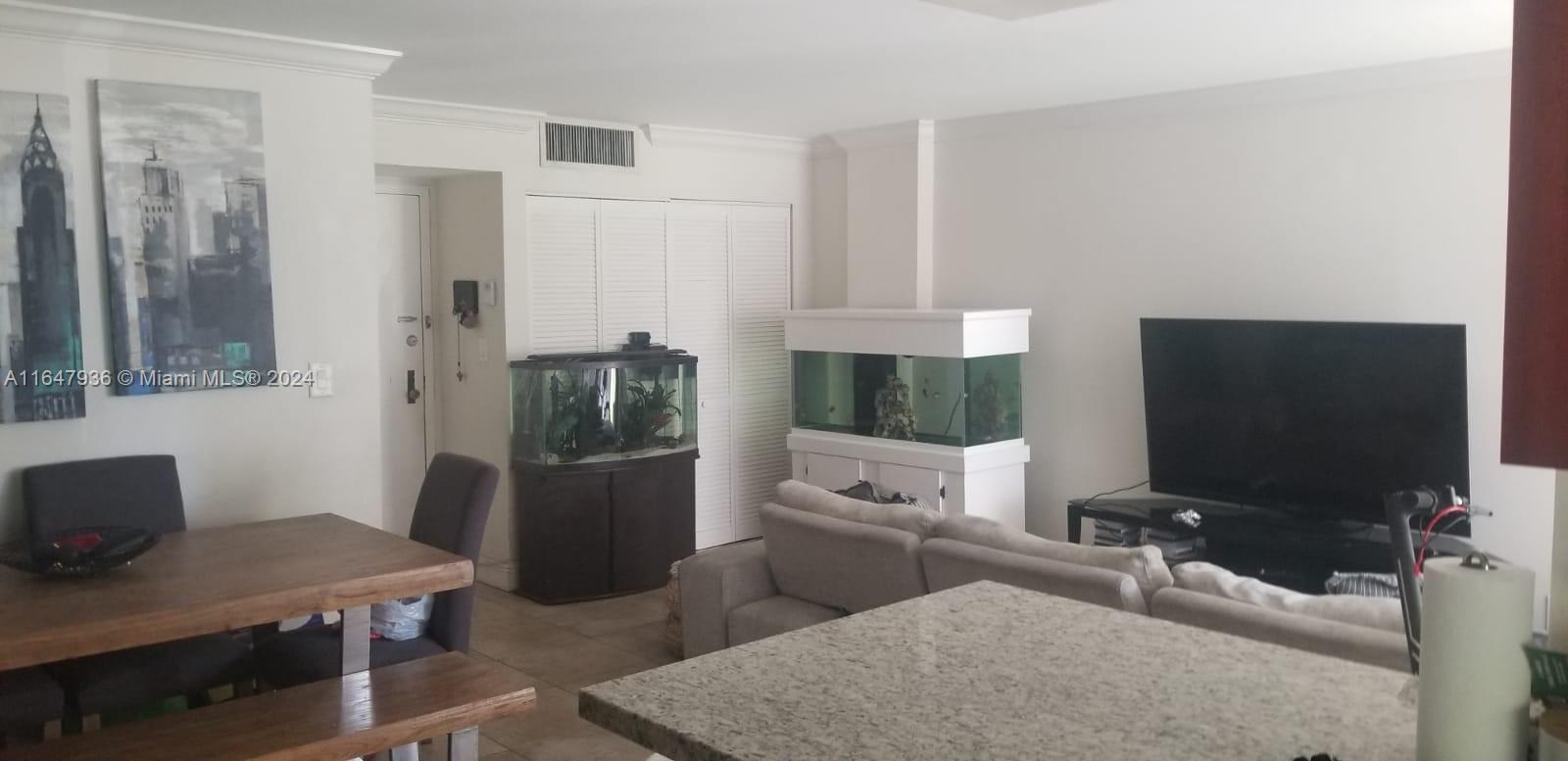 LOCATION!! SUNNY ISLES BEACH! 1 BED / 1.5 BATH. SPACIOUS L SHAPE LIVING ROOM. Resort-style amenities include heated pool, Jacuzzi, gym, sauna, library, party room, tennis and basketball courts, trails, BBQ area. Maintenance includes high speed internet, Tv cable, water, 24hr security gate.  A+ K-8 SCHOOL IS JUST 5 MIN AWAY. MINUTES FROM AVENTURA MALL, FIU UNIVERSITY, ETC. The beach is just a few minutes away, perfect for those who love the sand and sea. Great for Investors! Easy to Show!