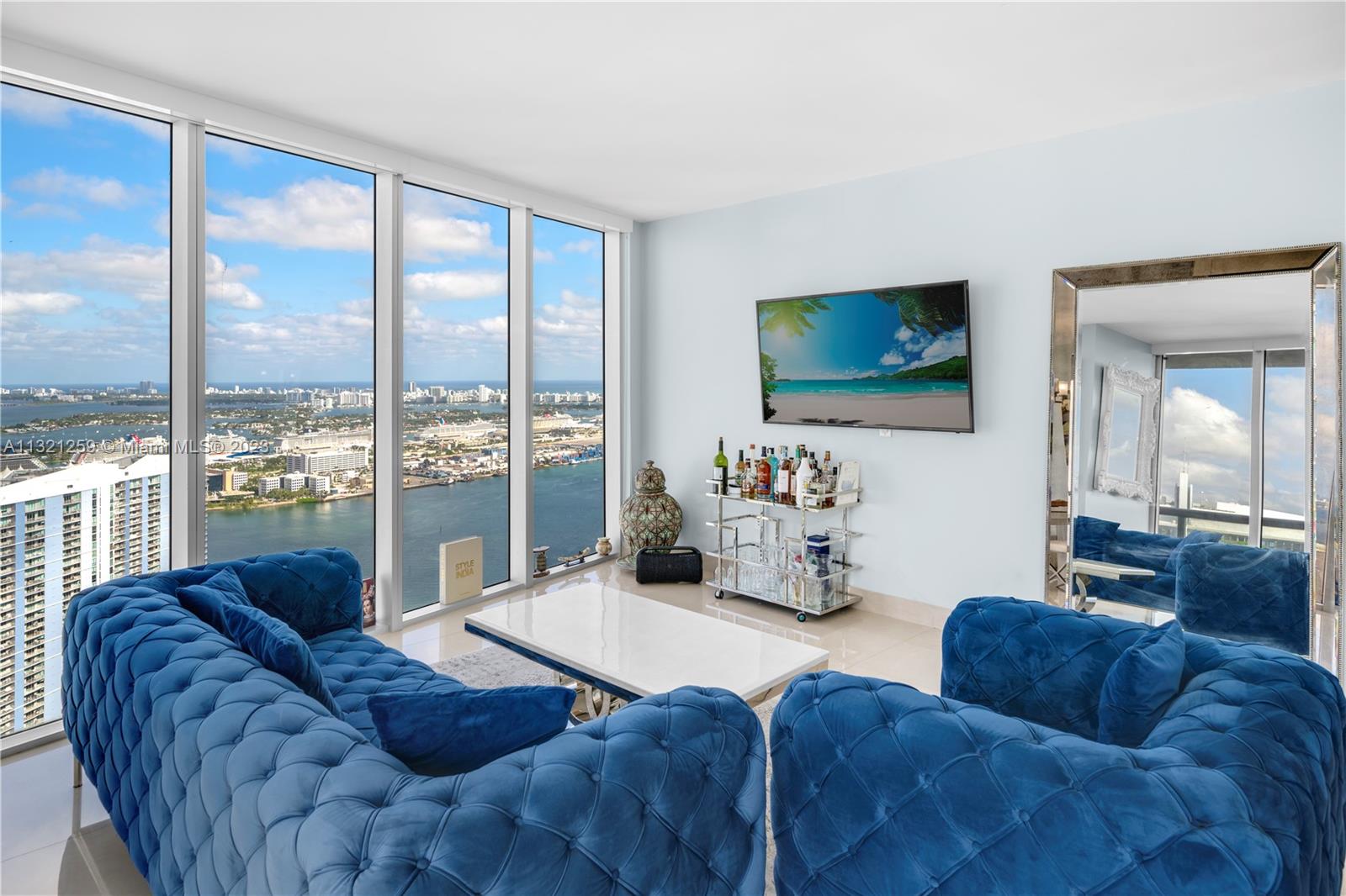 Live high in the sky at Icon Brickell. This FULLY FURNISHED split floor plan corner unit offers expansive views of Miami skyline, Port of Miami and South Beach. Porcelain floor throughout, wall to wall impact windows, top of the line appliances, and built in closets. Walking distance from 5- star restaurants, Brickell City Center and Mary Brickell Village.