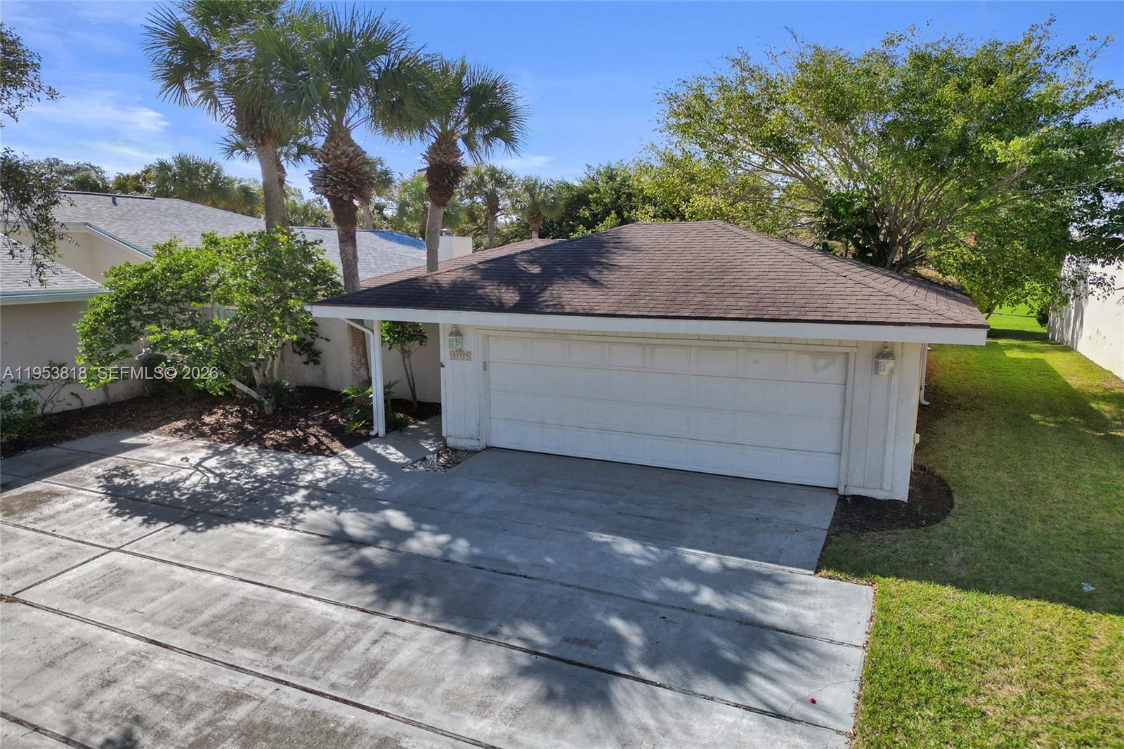 Elegant 2-bedroom, 2-bath residence with a 2-car garage, ideally positioned overlooking the golf course in a gated community of Jonathan Langings with 24-hour security. The home offers a spacious, light-filled floor plan with tile flooring throughout and seamless indoor living. Enjoy the convenience of the community pool located just steps from the residence, creating a resort-style atmosphere right outside your door. A perfect blend of comfort, privacy, and lifestyle in a well-maintained setting. Easy to show, please click on showing time.