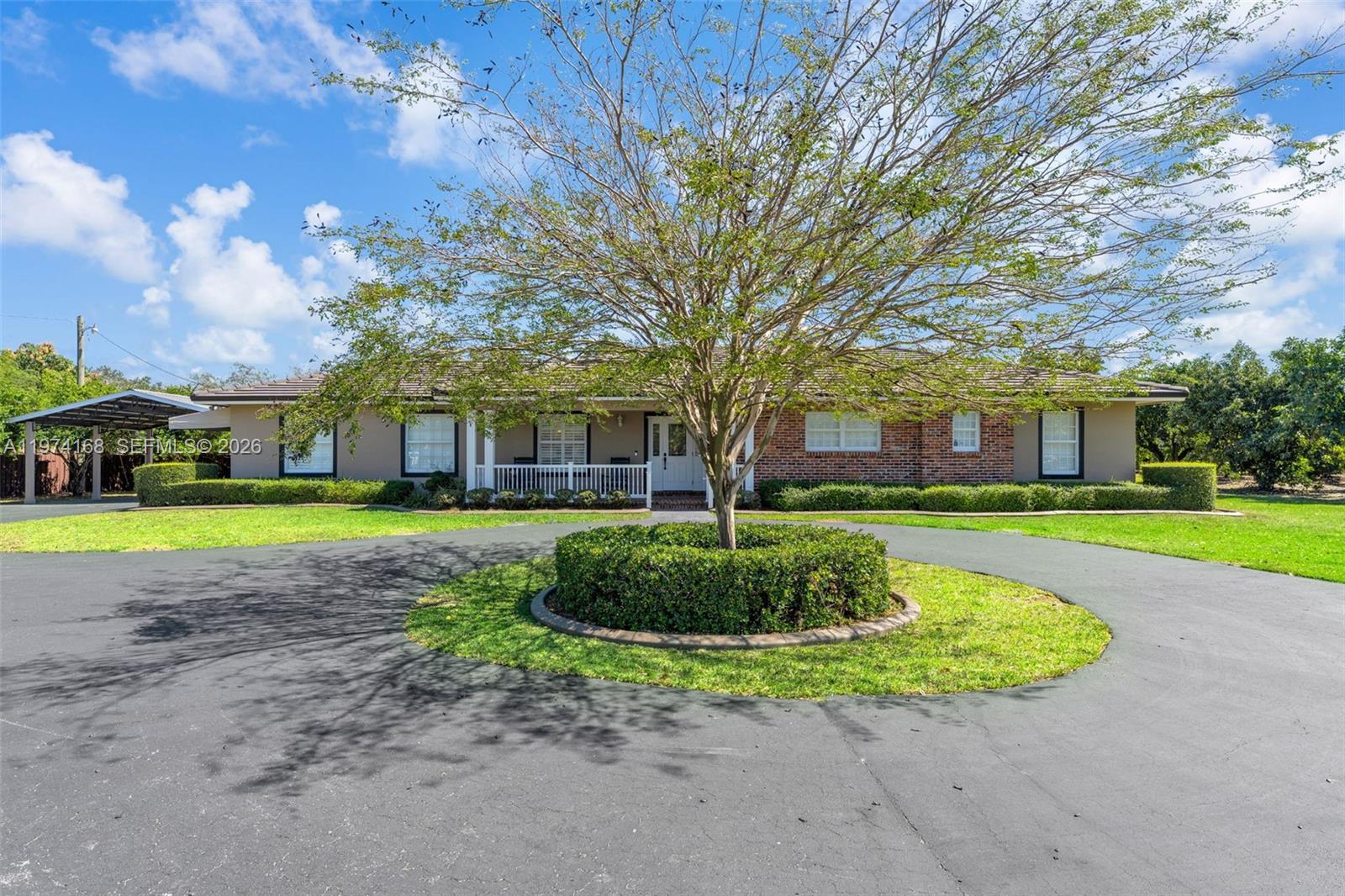 Exceptional 2.5-acre property located in the highly sought-after Redland agricultural area of Miami-Dade County. This fully fenced and meticulously maintained parcel features mature, producing avocado trees and offers privacy, open green space, and agricultural potential.

The residence offers approximately 2,000 square feet of living area with 3 bedrooms and 2 bathrooms, and has been thoughtfully renovated and upgraded. Improvements include updated interior finishes, modernized kitchen and baths, and well-maintained systems.

The grounds are manicured and irrigated, providing both functionality and curb appeal. Ideal for agricultural use, hobby farming, or enjoying expansive outdoor space while remaining conveniently located near major roadways, shopping, and dining.

Property is zoned agricultural. Buyers should verify zoning, land use, and potential agricultural exemptions with Miami-Dade County.

Shown by appointment only.