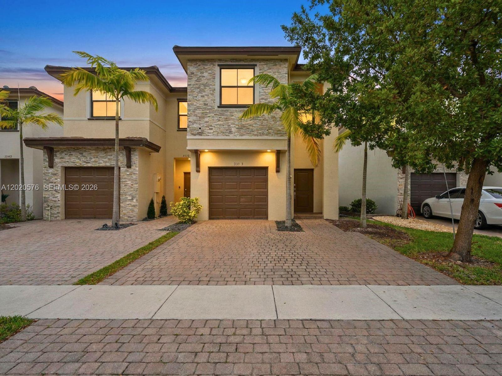 Beautifully maintained 3-bedroom, 2.5-bath twin home offering 1,872 sq. ft. of living space on a generous 3,550 sq. ft. lot. The open concept main level connects spacious living and dining areas, creating the perfect setting for everyday living and entertaining. The kitchen features brand new stainless steel appliances and flows naturally toward the covered patio and oversized backyard, making outdoor gatherings effortless. Upstairs, the expansive primary suite is a true retreat complete with a dedicated sitting area, walk-in closet, dual-sink vanity, and abundant natural light throughout. Additional highlights include an A/C-equipped garage and an unbeatable location just minutes from the Turnpike, shopping, and top-rated charter schools. Move-in ready and waiting for its next owner.