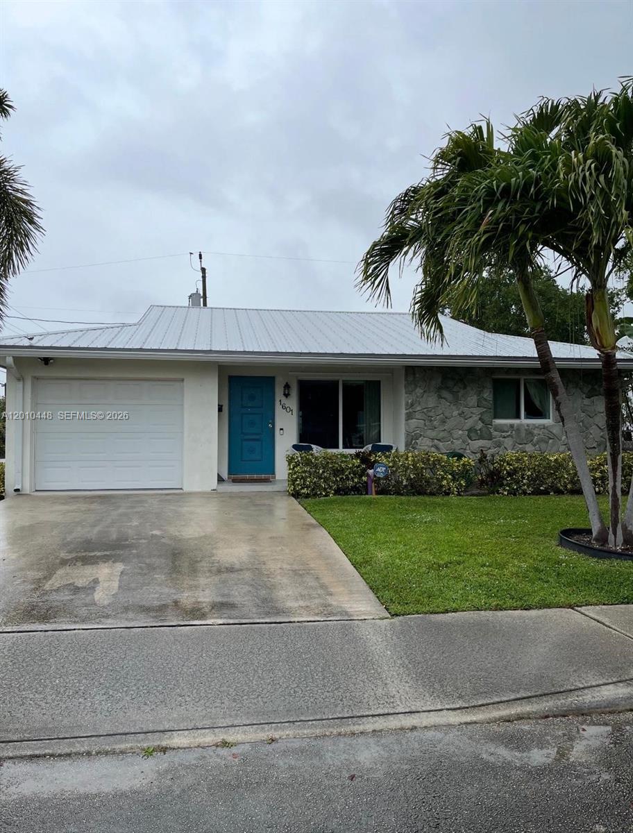 Move-in ready. 3-Bedroom, 2-Bath home with a metal roof, 1-car garage and driveway space. Bright functional layout with natural light throughout. All kitchen appliances, washer and dryer included. Conveniently located near beach, shopping, dining, and major roadways. 5 minutes from beach and I-95. Property is occupied until May 31st. Please allow us a 24-hour notice to show the property. Accepting all offers.
