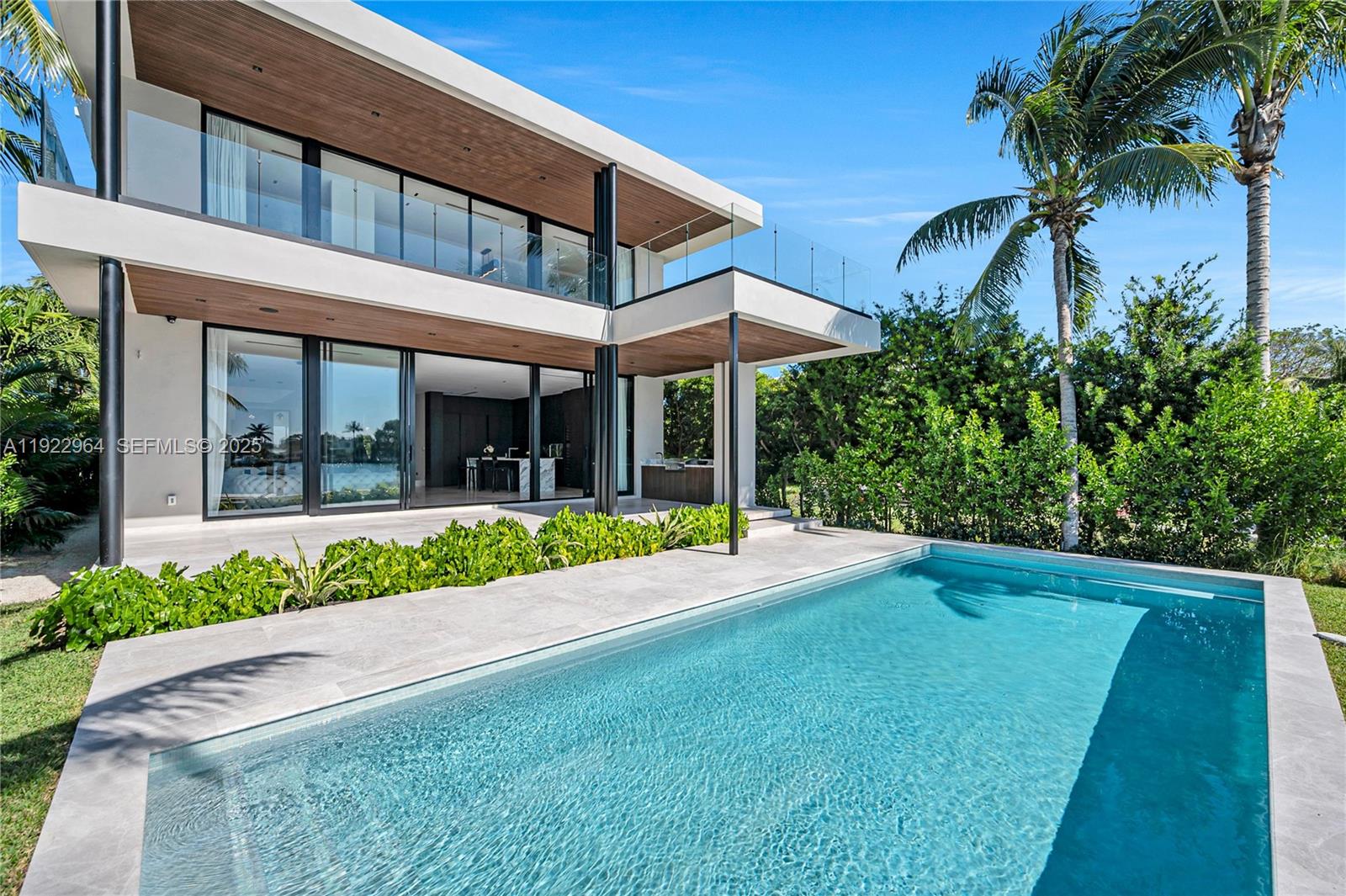 Experience luxury waterfront living in Miami Beach. This brand new, never-lived-in residence offers breathtaking Biscayne Bay views, spectacular sunsets, and 50 feet of waterfrontage with no fixed bridges to the ocean.

Spanning nearly 4,000 SQFT under A/C, the home features 4 spacious bedrooms and 4.5 bathrooms, sleek modern architecture, and meticulous attention to detail throughout. Premium finishes, expansive indoor-outdoor living areas, and a private boat dock elevate the waterfront lifestyle.

Located on a gated island, this property includes a 2-car garage, and is within walking distance to the beach and close to top-rated schools—offering the perfect blend of luxury, comfort, and convenience.