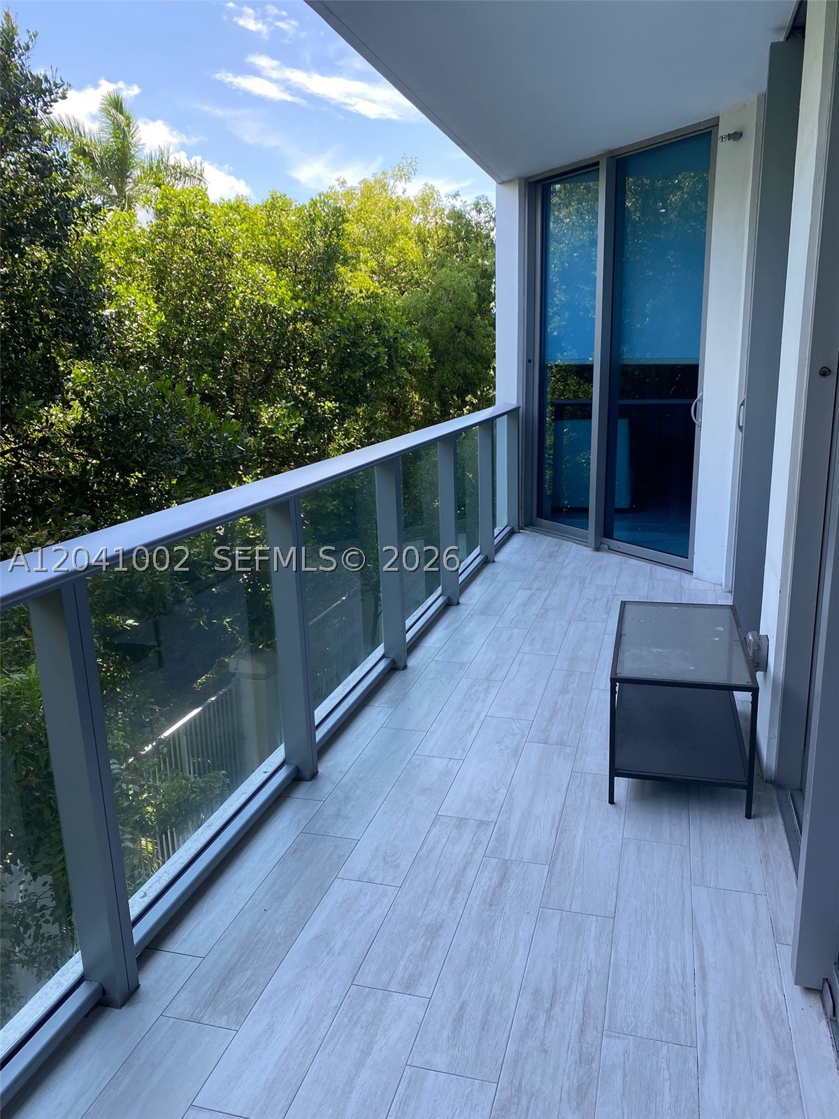 Beautifully appointed 3-bedroom, 3.5-bath residence with a den (easily convertible to a 4th bedroom) at Marina Palms Residences, North Miami Beach. Garden-facing with Italian cabinetry by Snaidero, Sub-Zero and Wolf appliances, and finished custom closets throughout. Includes one covered parking space, complimentary 24-hour valet, and air-conditioned storage. Five-star smart building amenities feature a state-of-the-art fitness center, spa with sauna, business and conference rooms, clubhouse, teen and kids rooms, social room, outdoor barbecue area, heated pool, kids pool, concrete hot tub, and a full-service 112-slip private marina. Boat club membership available. Easy financing option available.
