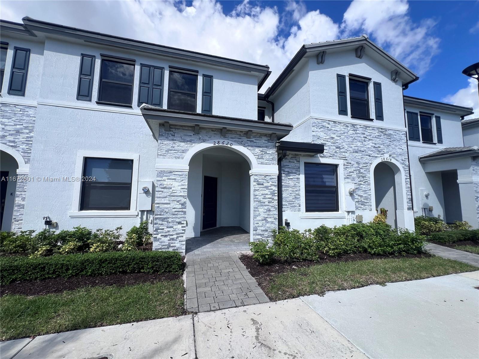 3 Bedrooms, 2 1/2 Bathrooms Townhome by Lennar conveniently located near the Turnpike, major grocery stores/pharmacies, shops/restaurants, the new Amazon warehouse center, Homestead Air Reserve Base, and the Florida Keys. This property is in a gated community and features new stainless steel appliances, a washer/dryer, a Ring doorbell, new ceramic floors on the first floor, and carpet on the second floor. The fenced patio is perfect for a BBQ area with grass. Energy-saving heater included. Located in a quiet neighborhood close to great schools, parks, and the Homestead Speedway Circuit. Easy to show—won't last!