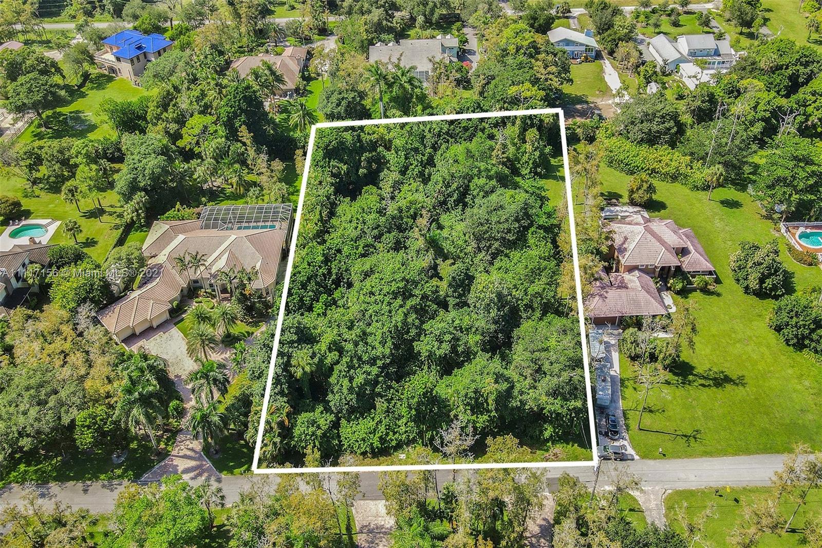 Amazing opportunity to build your custom dream home on a 1.25 acre piece of paradise.  Priced to sell, one of the largest available residential lots south of Holmberg Road in Pine Tree Estates.  Nestled among beautiful, custom estate homes on a quiet cul-de-sac offering privacy and country living at its best.  Live the Parkland lifestyle surrounded by equestrian activities, parks, and excellent schools. The zoned schools are Coral Park Elementary, Forest Glen Middle, and Coral Springs High School. No HOA.  Easy access to major thoroughfares, shopping, and restaurants.