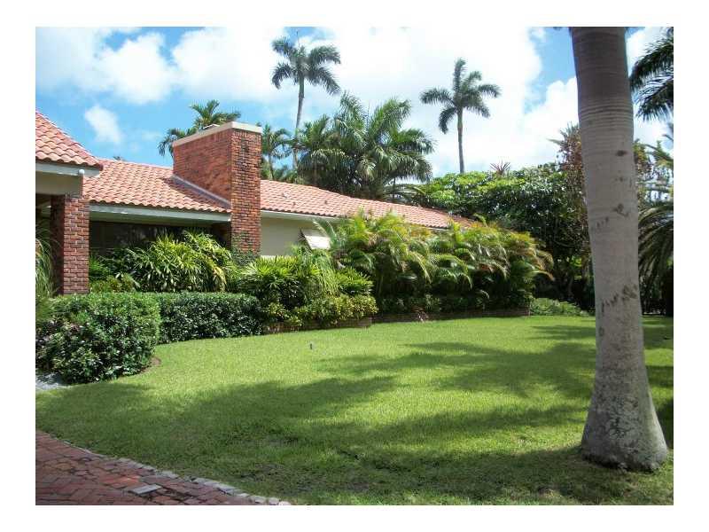 Gated Sunset Island, this exclusive corner is over 3,800 on a 12,325 sqft lot and consists of 5 bedroom, 5.5 bathroom home is complete with gourmet kitchen, floor-to-ceiling windows, lushly landscaped pool area and guest cottage with fireplace. Perfect fo r entertaining. No short term leases.  Rent is $14,500  if not furnished and tenant stays during Art Basel