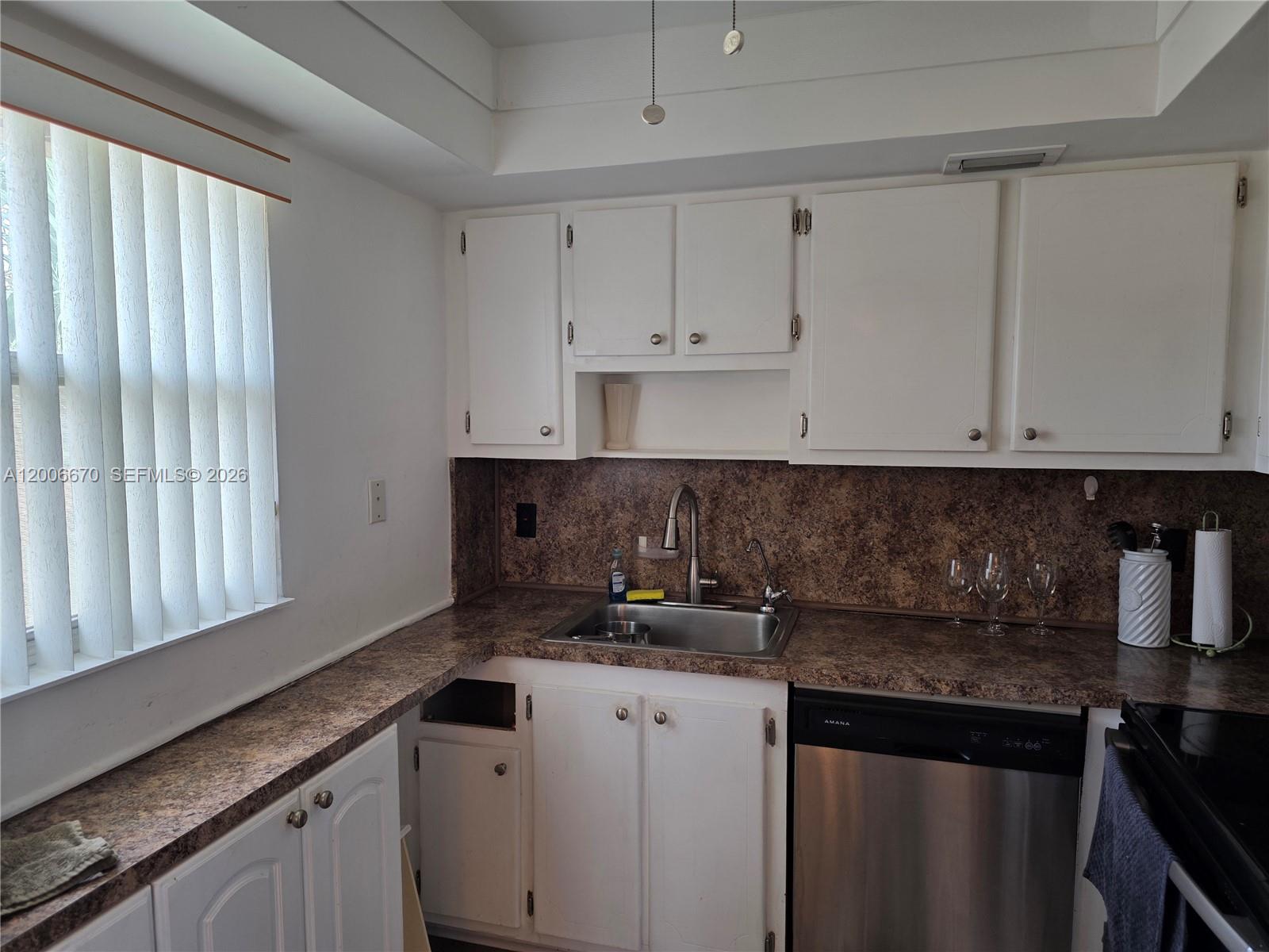 Welcome to 232 Saxony E in the desirable Kings Point community of Delray Beach. This well-maintained 2-bedroom, 2-bath condo offers a bright and functional layout with a spacious living and dining area, perfect for comfortable everyday living or seasonal enjoyment. The kitchen features ample cabinetry and storage, while the primary suite includes a private bath and generous closet space. Enjoy peaceful garden views from your screened-in patio, ideal for morning coffee or evening relaxation. Located in a vibrant 55+ gated community, residents of Kings Point have access to an array of amenities including a clubhouse, indoor and outdoor pools, fitness center, tennis courts, golf, courtesy shuttle, and a full calendar of social activities. Conveniently situated just minutes from shopping, dining, and the beaches of Delray, this is an excellent opportunity to enjoy the South Florida lifestyle at an affordable price.