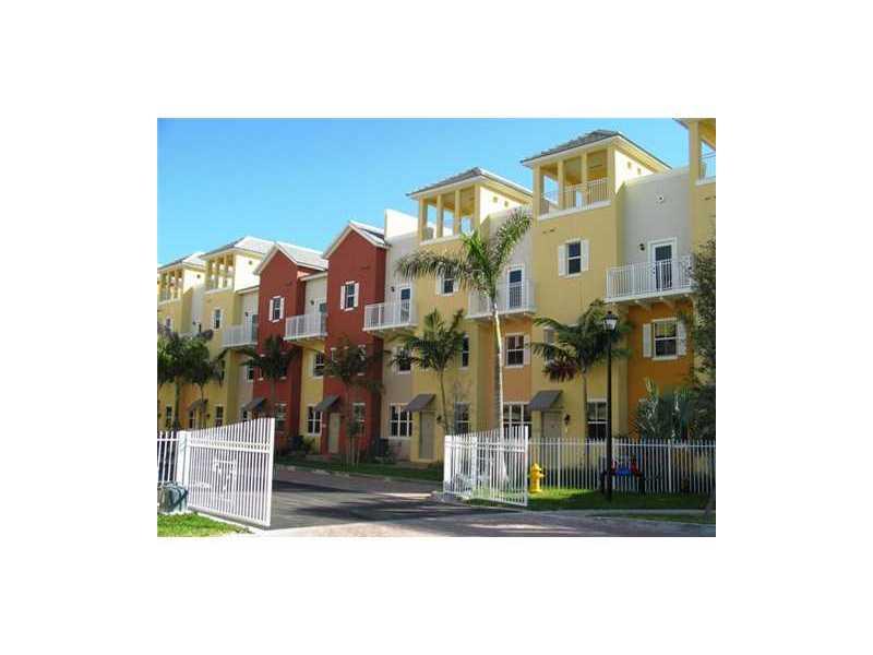LUXURY TRI-LEVEL TOWNHOME W/658 SQ FT ROOF TOP TERRACE OF CITY VIEWS. FEATURES INCLUDE TILE & CARPET FLOORS, GRANITE IN KITCHEN & SS APPLIANCES. 1952 SQ FT OF INTERIOR SPACE WITH BEDROOM/BATH/2 CAR GARAGE ON 1ST LEVEL. MAIN LEVEL HAS LIVING/DINING/KITCHEN /POWER RM. UPSTAIRS YOU HAVE MASTER BEDROOM W/WALK IN CLOSET, MASTER BATH WITH SEPARATE TUB/SHOWER & DUAL SINKS. BEDROOM 2 HAS OWN BATH & BALCONY. WASHER/DRYER. TAKE STAIRS TO ROOF. GATED COMMUNITY EAST OF US1 W/COMMUNITY POOL/SPA. PETS OK.