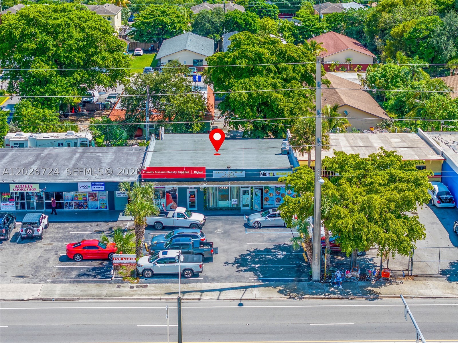 Located in the Progresso Village / South Middle River area of Fort Lauderdale, just minutes from Downtown and I-95, this 2,700 SF commercial property at 1026 NW 9th Ave offers excellent exposure along a high-traffic corridor with roughly 31,500 vehicles per day. The property features 10 parking spaces and a new roof for reliability. Fully occupied by three tenants—two restaurants and a beauty supply store—it generates an NOI of $75,845.67. All tenants have scheduled rent increases—two in January 2026 and one in December this year—creating immediate and continued income growth. With a pro forma GOI of $105,828.00, this fully leased asset offers stable cash flow and strong upside through rent escalations and potential NNN conversion.