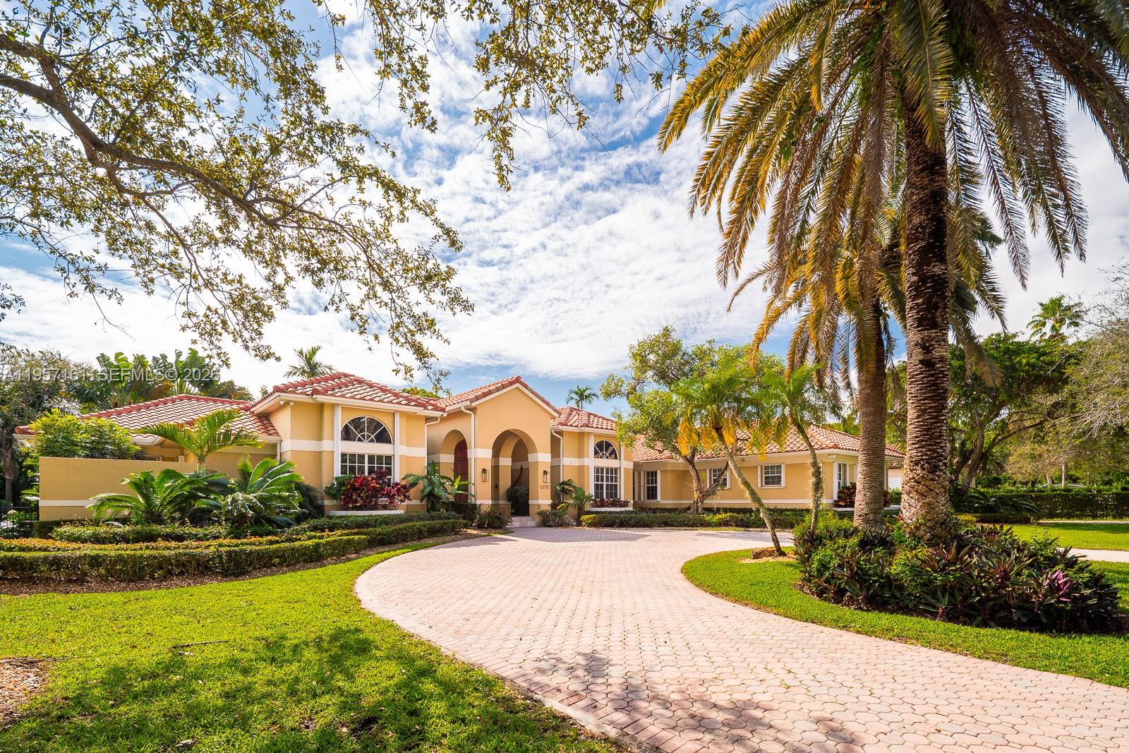 Step into timeless elegance in this Tuscan-inspired estate, perfectly set on a lush 31,888 SF lot with a heated saline swimming pool designed for year-round enjoyment. This expansive residence offers 6 beds/5 baths blending classic charm with refined modern updates. Marble and solid wood floors throughout, with a gourmet kitchen featuring a new Sub-Zero refrigerator, striking blue semi-precious stone countertops and maple shaker cabinetry, ideal for both everyday living and elegant entertaining. Primary suite featuring a tranquil, spa-like bathroom designed for ultimate relaxation. Generously designed bedrooms make this home as functional as it is beautiful. Located by Gables by the Sea and minutes from Gulliver, this exceptional property offers privacy, sophistication and convenience in one remarkable setting.