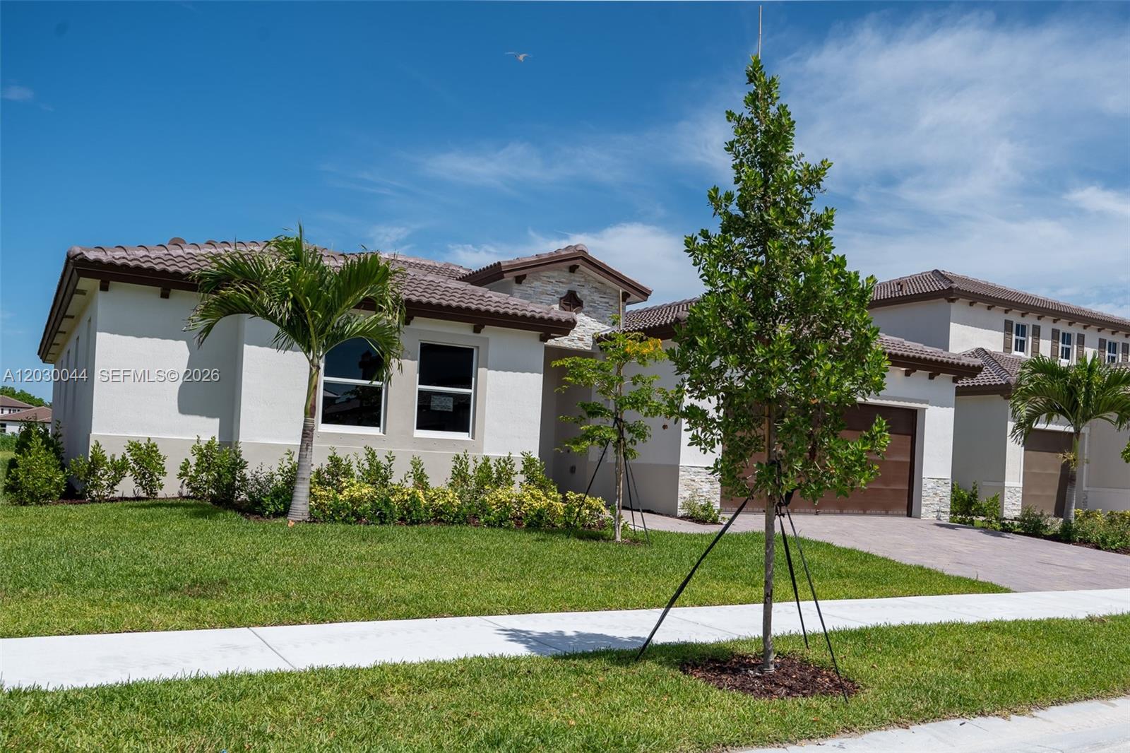 Brand-new home in the desirable gated Altamira community in Homestead! This unique property features a spacious 3-bedroom, 2-bathroom main residence plus a private Next Gen suite with its own separate entrance, living area, bedroom, and full bathroom—ideal for extended family, guests, or added privacy. The home offers modern finishes, an open-concept layout, and a fully fenced backyard coming soon.

Conveniently located just minutes from the Florida Turnpike, Homestead Air Reserve Base, Baptist Health Homestead Hospital, and major shopping destinations including Publix, Walmart, Target, and Homestead Pavilion. Enjoy easy access to local restaurants, parks, top-rated schools, Black Point Marina, Biscayne National Park, and the Florida Keys. Residents will soon have access to the community's new amenity center, making this one of Homestead's most exciting new neighborhoods. Experience comfort, flexibility, and convenience all in one place!