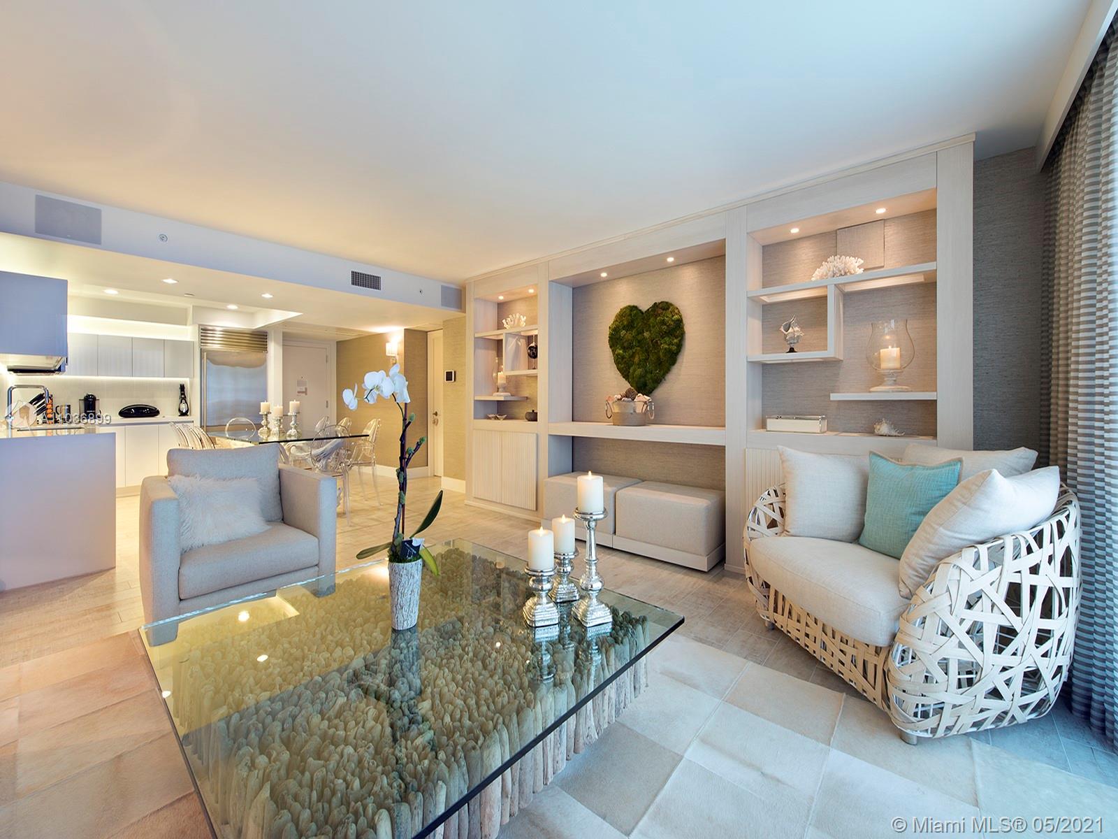 Enjoy breathtaking views of Miami Beach from your own private, fully furnished double balcony. Nothing was spared in this custom decorated one-of-a-kind celebrated condo. Enjoy a fully stocked ItalKraft gourmet kitchen. Relax in your sensual limestone bathrooms with luxurious Dornbracht fixtures. Enjoy a variety of services including a private fully-staffed residence lobby, valet attendants, personal concierge, and chauffeured Tesla SUVs. Eco-conscious amenities to include 4 pools, 4 restaurants, 3 bars, 14,000 sq. ft. gym, Bamford spa, hair salon, Soul Cycle, and much more. Make this stunning condo your new home away from home! Condo has been managed through Five Star Luxury Travel for several years and brings in great rental income.