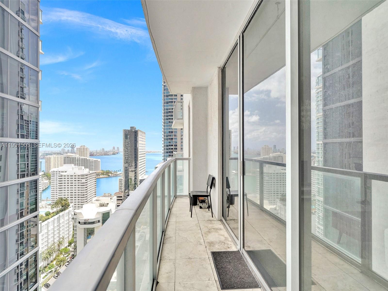 Fully furnished, spacious studio/loft located on the 27th floor in the heart of Brickell, offering stunning skyline, city, and partial Biscayne Bay views. This modern unit features a contemporary kitchen with stainless steel appliances, granite countertops, wood cabinetry, marble floors, and floor-to-ceiling impact glass doors leading to a private balcony. Washer and dryer inside the unit. Includes assigned covered parking and a flexible rental policy allowing 30-day minimum leases up to three times per year, making it ideal for both end users and investors.

Residents enjoy beautifully designed outdoor areas and resort-style amenities, including a state-of-the-art fitness center, swimming pool, sundeck, yoga/aerobics room, spa treatment room, game room, virtual golf simulator, and billiards table. The building also offers 24/7 concierge, valet parking, and security. Prime location near Mary Brickell Village and Brickell City Centre, with direct access to a French bakery and easy access to MetroMover, public transportation, world-class dining, shopping, and entertainment.