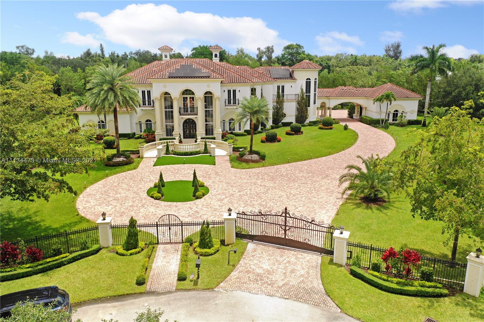 AVAILABLE FOR RENT JANUARY 17, 2022 SPACTACULAR ESTATE HOME SITTING ON 2 ACRES OF LAND. ENJOY THIS VERY PRIVATE, GATED, FULLY FURNISHED ESTATE HOME IN SUNSHINE RANCHES. THE MOST DESIBERABLE LOCATION IN SOUTHWEST RANCHES. THIS HOME HAS BEEN COMPLETELY REMODELED UPDATED WITH THE LATEST SMART HOME TECHNOLOGY. THIS HOME IS UPGRADED WITH AN ELEVATOR, LARGE 3 CAR GARAGE WITH 3 ELECTRIC CAR PLUGS, EPOXY FLOORING AND ADDITIONAL INDIVIDUAL SUPER CAR GARAGE. HEATED POOL AND JACCUZZI, PLEASE CALL FOR A PRIVATE SHOWING. DRIVEWAY CAN HOST 45+ CARS.