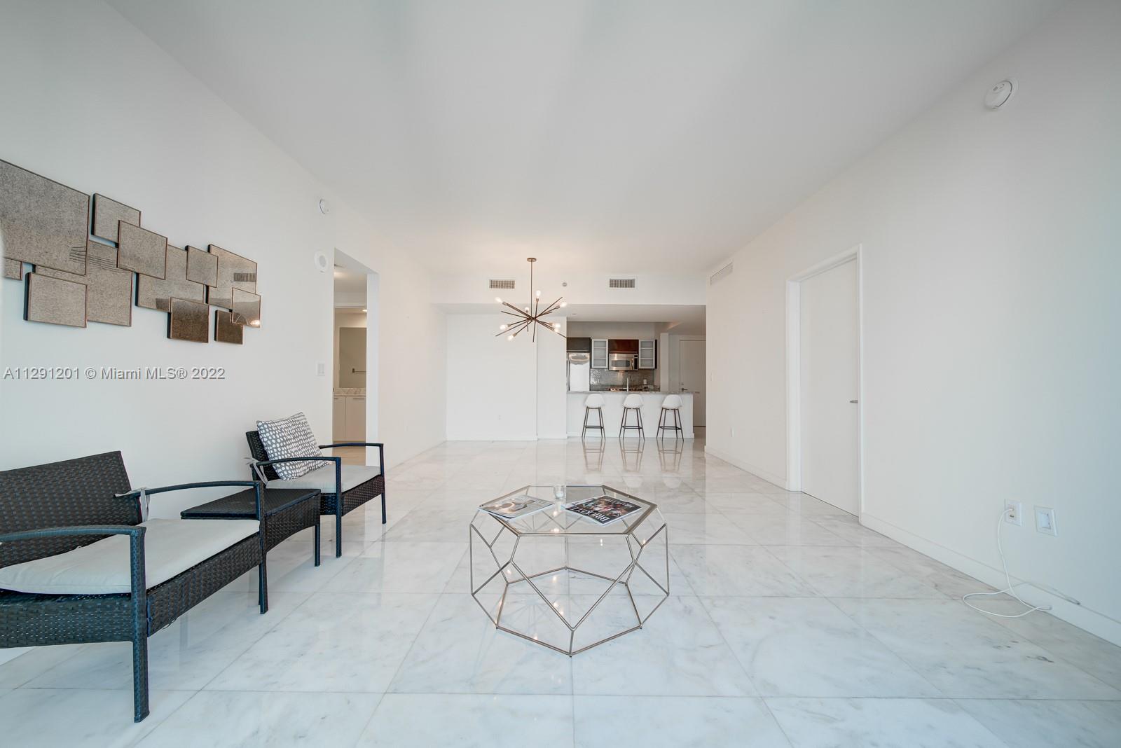 THE PLAZA 901 BRICKELL CO - Residential Lease