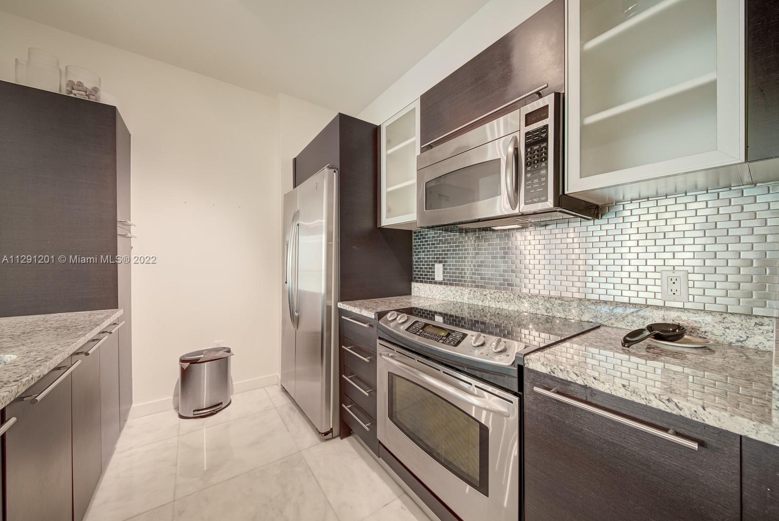 THE PLAZA 901 BRICKELL CO - Residential Lease