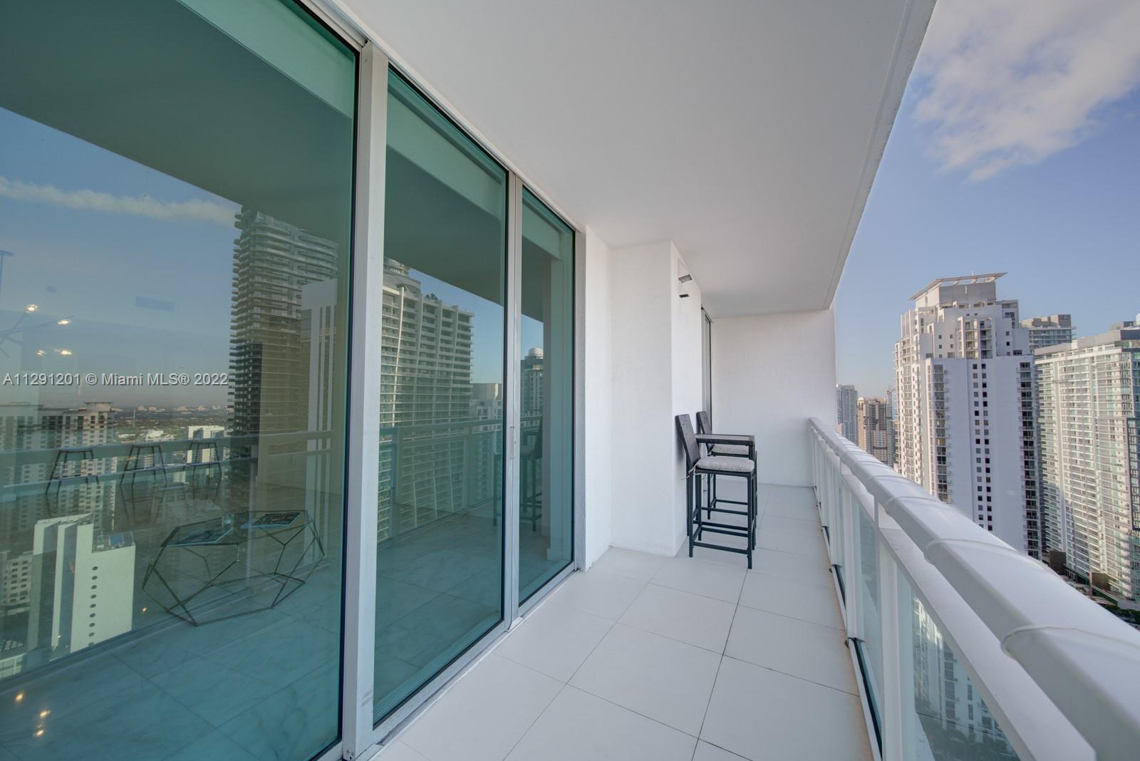 THE PLAZA 901 BRICKELL CO - Residential Lease