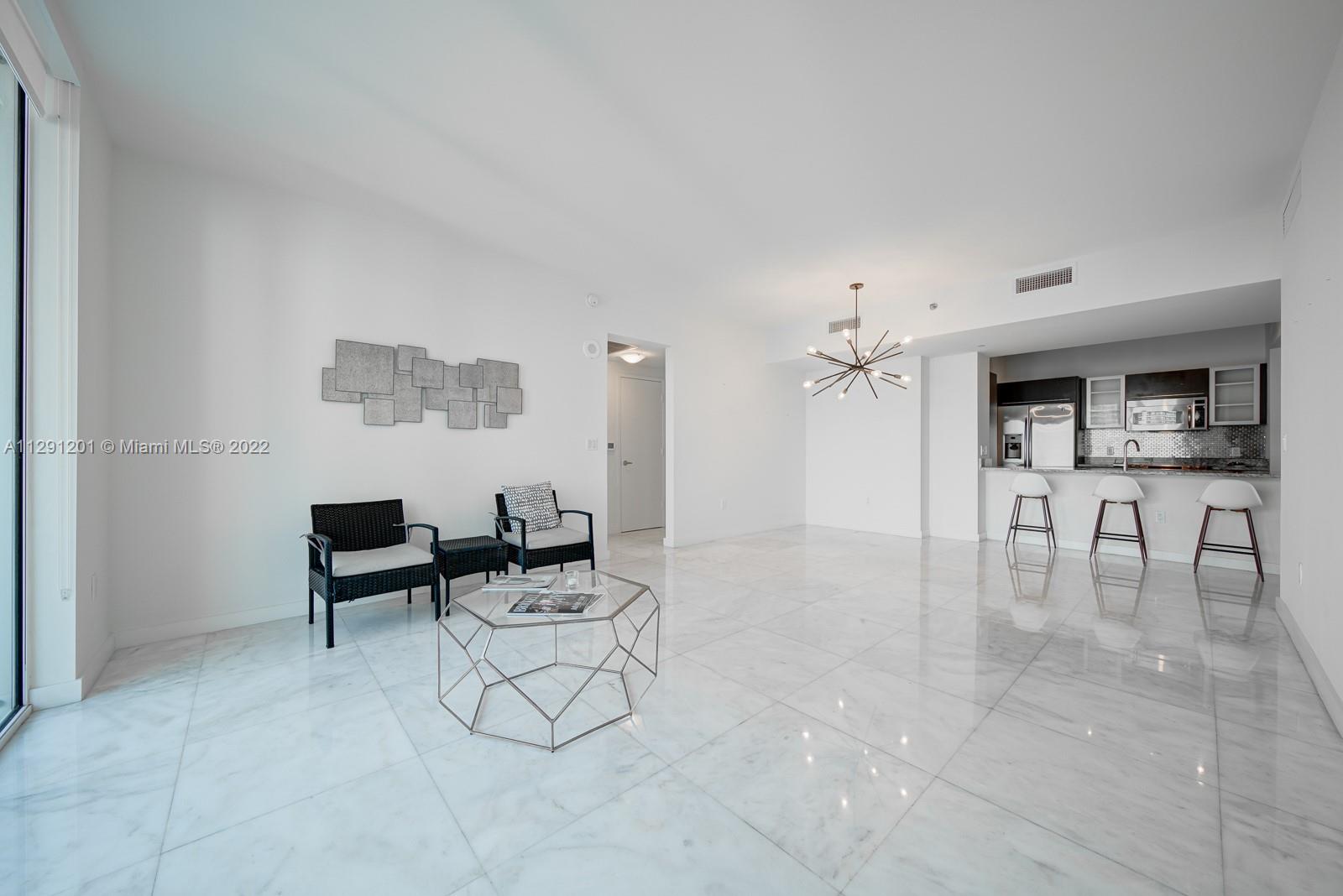 THE PLAZA 901 BRICKELL CO - Residential Lease