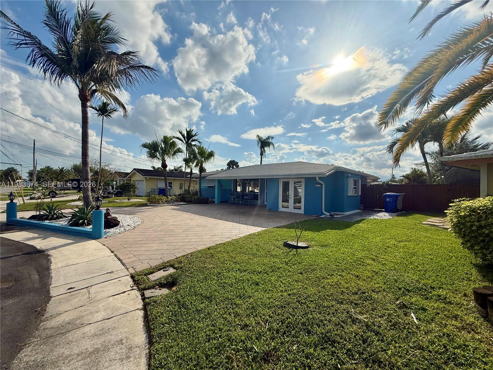 Welcome to your own private paradise in Garden Isle! This charming single family 2 bedroom, 2 bathroom home has Ocean Access for your boat with 80' of water-frontage.  Fantastic neighborhood near all that Pompano has to offer with a convenient location between Downtown and the Beach.  This property features a porch, patio and dockage with the former Garage Space currently utilized as a Recreation Room. New Roof updated in 2024.