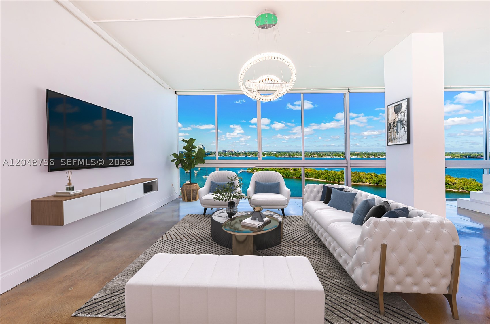 GORGEOUS 12th FLOOR BAY FRONT DREAM LOFT! Ideal for anyone seeking a serene, safe, and well maintained
community. Enjoy DIRECT BAY VIEWS, DOLPHIN watching, AMAZING SUNSETS, and the Miami SKYLINE. Take
relaxing baths in your very own INFINITY BATHTUB. Large 1848 SF open floor plan can be styled to suit your
needs. OPEN DESIGNER GOURMET KITCHEN, 12' CEILINGS, FLOOR TO CEILING and WALL TO WALL HURRICANE
IMPACT WINDOWS with MOTORIZED BLINDS, polished concrete floors throughout, and UPDATED BATHROOMS with
MAKEUP VANITY in primary bathroom. 2 PARKING SPACES & GUEST PARKING. GREAT BOUTIQUE bldg. SECURE
entry, electric car charge stations, ROOFTOP POOL & HOT TUB with 360 degree bay views, full GYM, & BAY FRONT
walkway with BBQ area. Pets welcome. You'll FALL IN LOVE with this HARBOR ISLAND BEAUTY!
