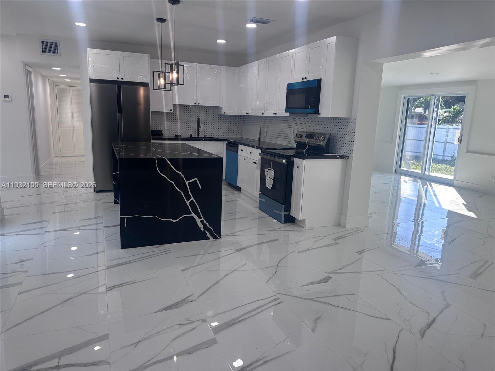 Fully remodeled single-family residence located at 19800 NW Miami Th Ct. The home offers a new roof, new air conditioning system, and impact-resistant windows throughout. Interior updates feature modern finishes and functional living spaces, providing a move-in ready opportunity for a primary residence. Conveniently located near major roadways, shopping, schools, and everyday amenities.