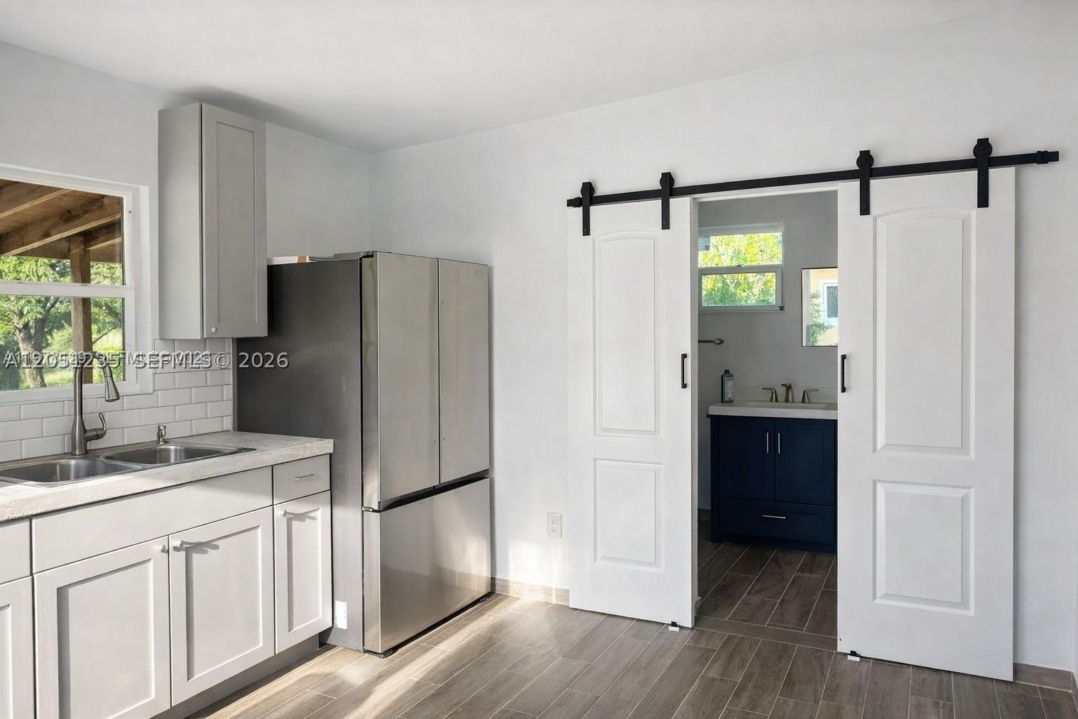 Live in and enjoy this beautifully remodeled 2 bedroom property with substantial land and privacy in the Redlands.  All the utilities are included in the rent.  There is no HOA, so the approval is by the owner/landlord via a standard background check.  Easy access to Krome Ave. Near fruit and spice park.