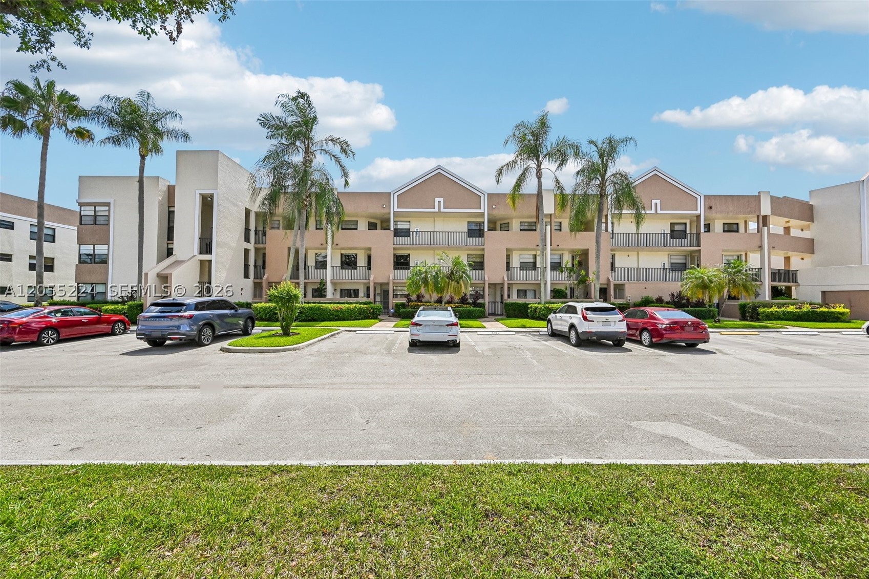 Welcome to this beautifully maintained 2-bedroom, 2-bathroom condo with lake views in the desirable Fairfax at Kings Point, a premier 55+ active adult gated community.

This bright and inviting home is filled with natural light and features a spacious open floor plan designed for comfortable living and entertaining. Freshly painted in neutral tones, the interior showcases elegant white tile flooring throughout, creating a clean and cohesive look. The updated white kitchen is complemented by beautiful quartz countertops, offering both style and functionality. The home has plenty of storage including a spacious walk in closet in the primary bedroom. 

Relax in the screened-in patio while enjoying peaceful lake views—the perfect place to start your morning or unwind at the end of the day.

Residents of Kings Point enjoy an exceptional resort-style lifestyle with an impressive array of amenities, including indoor and outdoor swimming pools, a sauna, fitness center, theater, billiards room, card rooms, art studio, and countless social activities and clubs. Conveniently located near shopping, dining, golf, and major roadways, this community offers the perfect blend of comfort, convenience, and active living.

Don't miss this opportunity to enjoy maintenance-free living in one of South Florida's most sought-after active adult communities.