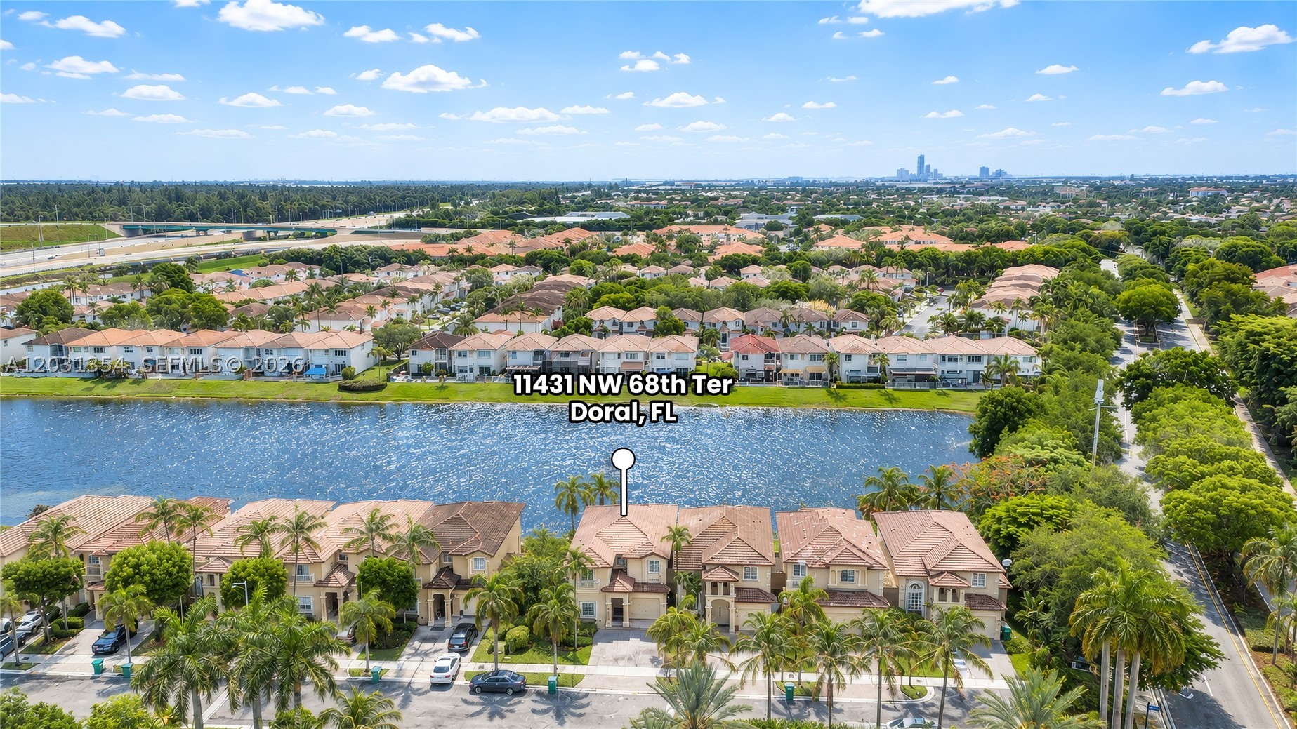 Exceptional lakefront corner home located in the exclusive gated community of St. Lucia in Doral. This spacious two-story residence offers the perfect combination of comfort, functionality, privacy, and location. This beautifully maintained home features 4 bedrooms and 3 full bathrooms, making it ideal for growing families and multigenerational living, including a highly desirable first-floor bedroom and full bath.

Designed for comfortable family living, with bright and open living spaces, a family room, and additional flexible areas upstairs, including a loft/family room and office space. The converted garage provides even more versatility and can be used as a playroom, entertainment area, gym, or workspace.

2 Premium features. As a corner home, it enjoys added privacy and abundant natural light. Even more impressive are the direct lake views. The beautiful waterfront setting creates a sense of openness and tranquility rarely found in Doral.

St. Lucia is a private community of only 55 homes, offering a quiet neighborhood atmosphere, a community playground, and low monthly HOA fees.

Ideally located in the heart of Doral, the property is just minutes from top-rated schools, parks, restaurants, shopping, supermarkets, and entertainment. Convenient access to Florida’s Turnpike and major roadways makes commuting easy and efficient.

A rare opportunity to own a spacious lakefront home in one of Doral’s most exclusive and sought-after communities.