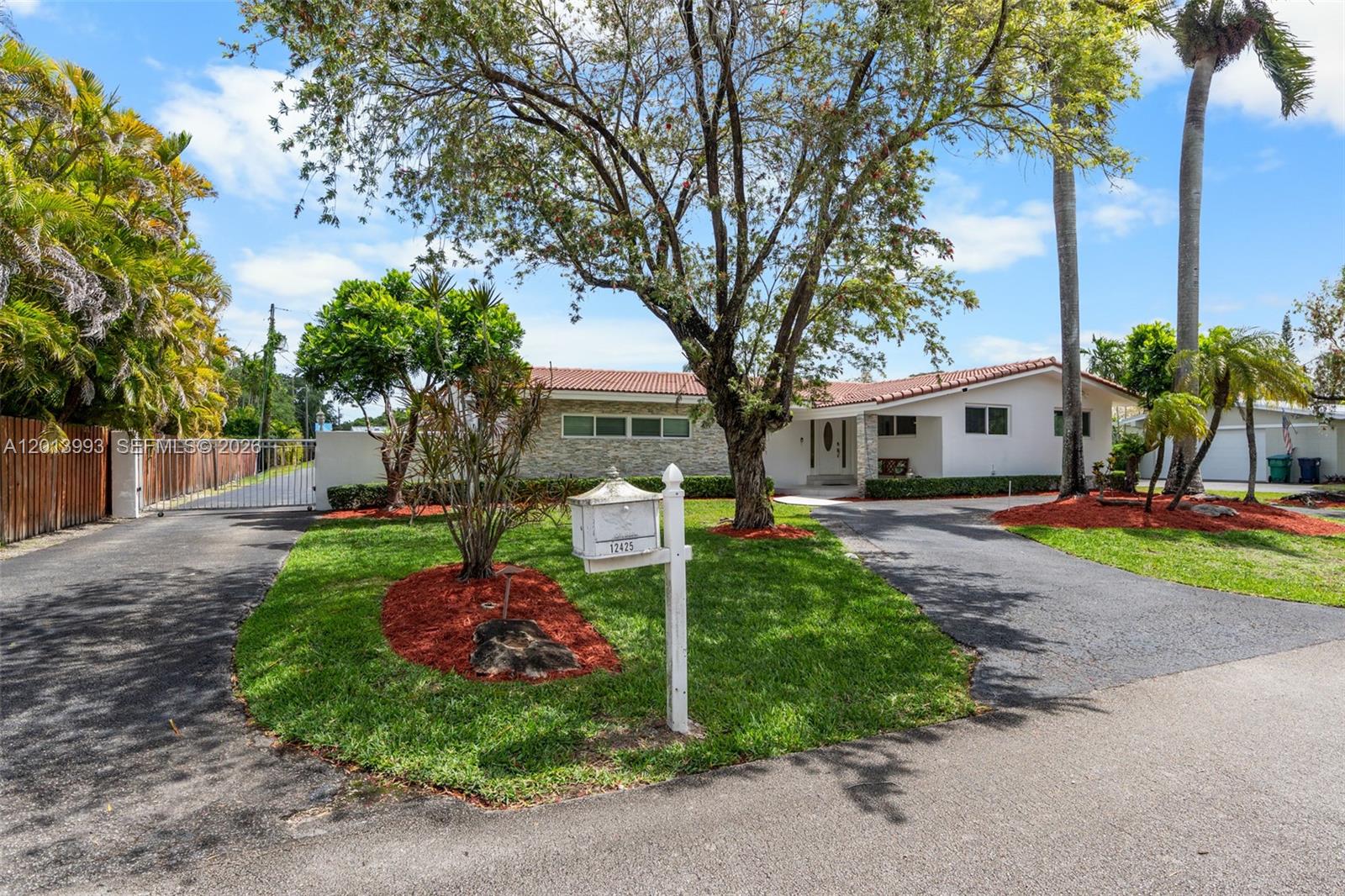 Exceptional property located in one of Miami’s most sought-after residential neighborhoods.  Situated on an oversized 15,052 sq ft lot, this beautiful residence provides the perfect setting for families, entertaining, and enjoying the best of South Florida living. Ideally positioned near highly rated A+ schools, the property is an excellent opportunity for families seeking luxury and top educational options. The main residence features 2,081 sq ft of thoughtfully designed living space, including 3 spacious bedrooms, 2 bathrooms, and a versatile den. The kitchen was tastefully renovated a few years ago, combining timeless style with modern convenience. Natural light flows throughout the home, creating a warm and inviting atmosphere. The property also includes a detached 413 sq ft guest house, bringing the total living area to approximately 2,494 sq ft. Complete with its own kitchen, living room, 1 bedroom, and 1 full bathroom, this private space is ideal for guests, extended family, rental income, or a private office.
The outdoor areas feature a large swimming pool, barbecue area, and charming balcony perfect for enjoying Miami’s year-round sunshine. Additional highlights include a covered 2-car carport, extended driveway with parking for up to 4 additional vehicles, hurricane-impact windows and shutters, and a generator for added security and peace of mind. This rare property offers versatility, comfort, and exceptional value in one of Miami’s premier locations.
