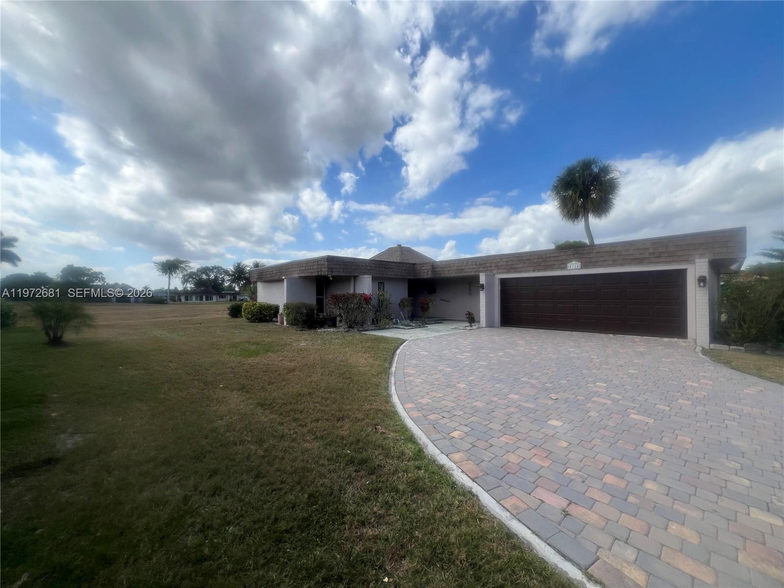 Well maintained 2-bedroom, 2-full bath residence offering comfort, functionality, and modern appeal. This light and bright home features an open-concept living with vaulted a ceiling and dining area, spacious bedrooms, and well-appointed bathrooms designed for everyday living located in the Woodlands Development of Tamarac. Centrally located, close to shops, dining and turnpike. A must see. Call listing agent for further details.