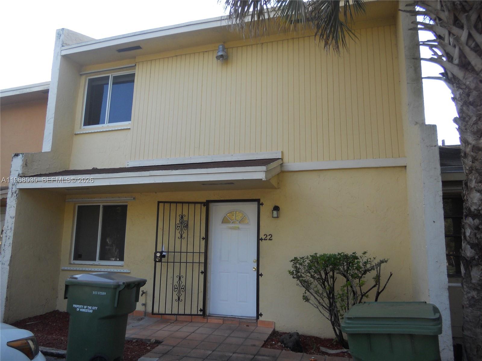 Two story true townhouse, all tile floors, washer dryer inside, private driveway in the front, fenced backyard in rear. Two bedrooms and one bathroom upstairs.  One bedroom and one bathroom downstairs.