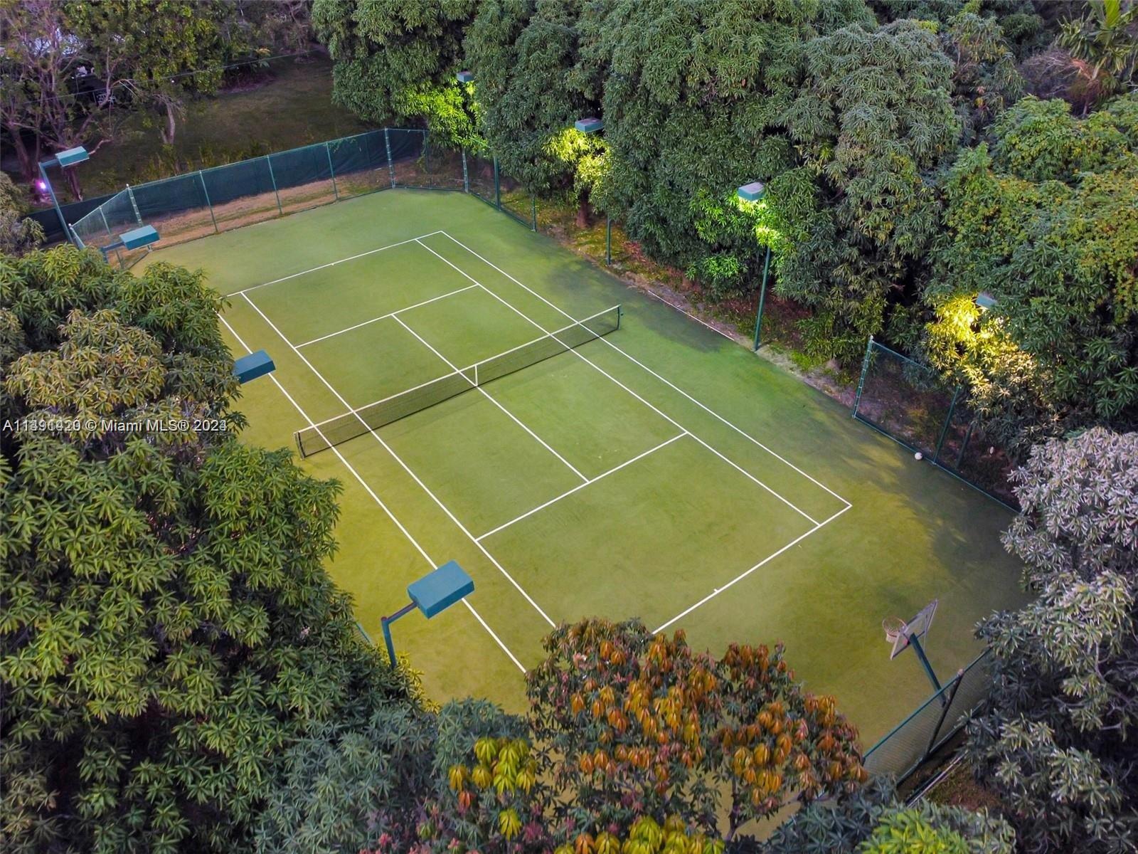 Bring the family and enjoy this quiet neighborhood surrounded by luxury homes and the best public and private schools. Step into paradise when you stay at this luxury home in Pinecrest. Remodeled 5 bedroom 6 baths house with private pool, Tennis and Basketball court, and Small Golf court situated on 1.17 acres. Updated to perfection with modern kitchen with top-of-the-line appliances with breakfast area, overlooking the pool area. The house has two separate living spaces. Depending on the time of the year enjoy delicious mangos and avocados right from your backyard. Excellent location: parks, restaurants, Target, Publix, Dadeland Mall.