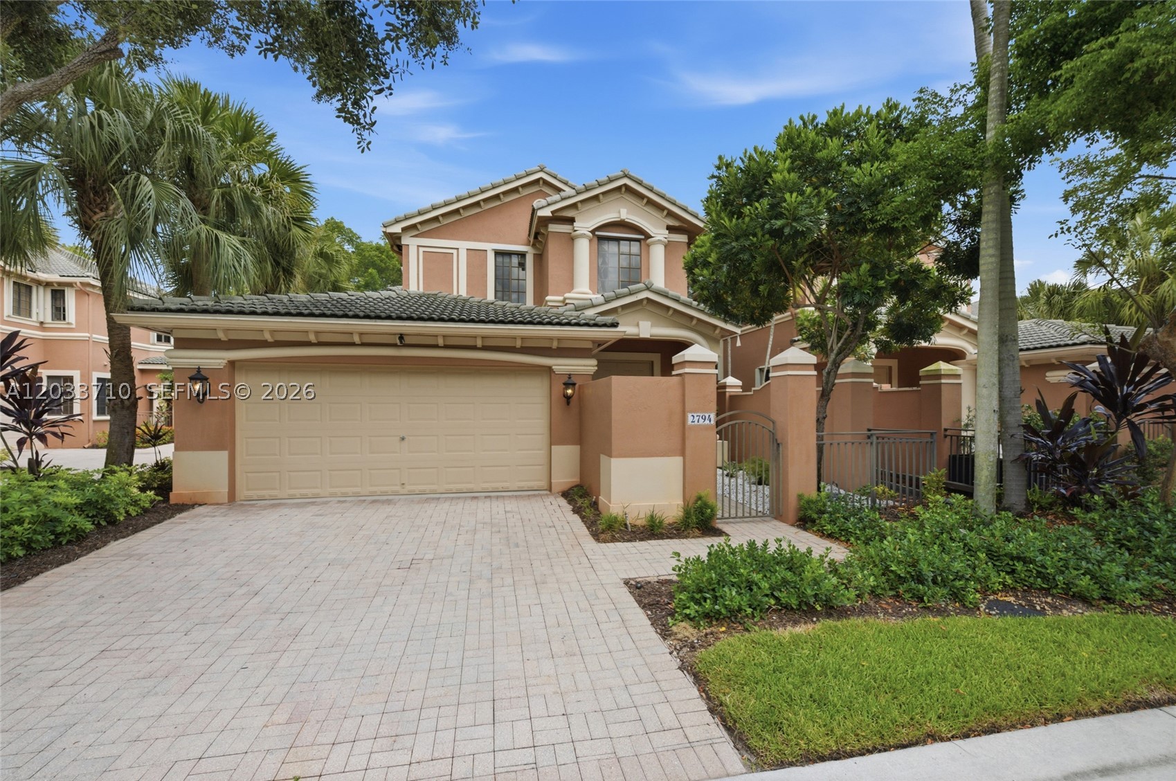 Located in the heart of Weston, this model-perfect home is truly move-in ready. Situated in the exclusive gated community of The Legends at Weston, this spacious residence offers 4 bedrooms, 2.5 baths, and a 2-car garage. Recently renovated, the home features luxury vinyl wood flooring throughout living areas, including the foyer and stairs, fresh interior paint, and full accordion hurricane protection. New kitchen showcases dual-tone cabinets with white quartz countertops, a grand center island with sink, stainless steel appliances, and a wall oven. Open-concept layout perfect for everyday living and entertaining. The spacious primary suite includes two walk-in closets and access to an oversized balcony. Spacious bath with Roman tub, separate shower, dual sinks. Ideally located across from Weston Town Center and within walking distance to Publix, restaurants, cafés, shopping, and more.